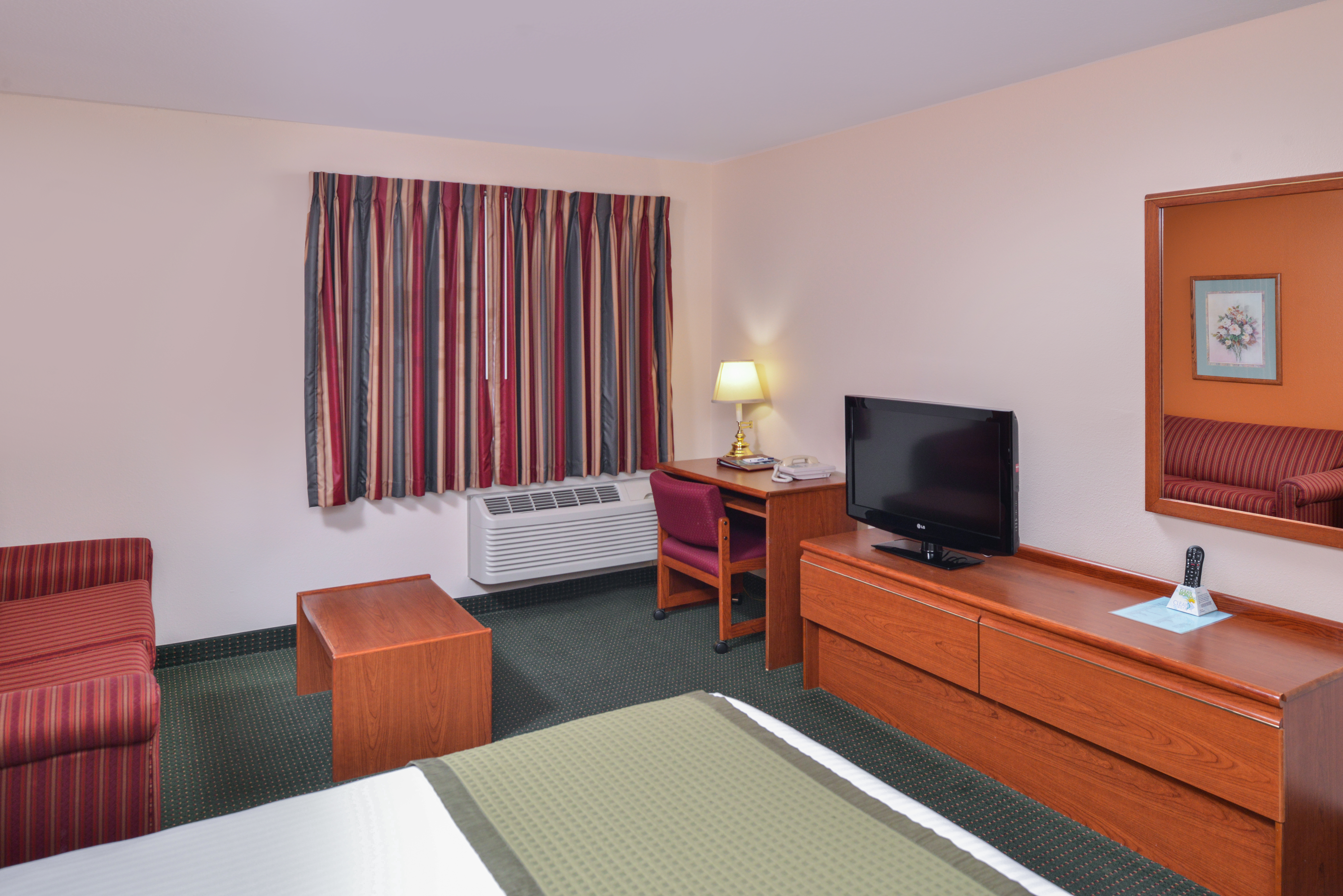 Guest room at the Travelodge Suites by Wyndham Newberg in Newberg, Oregon