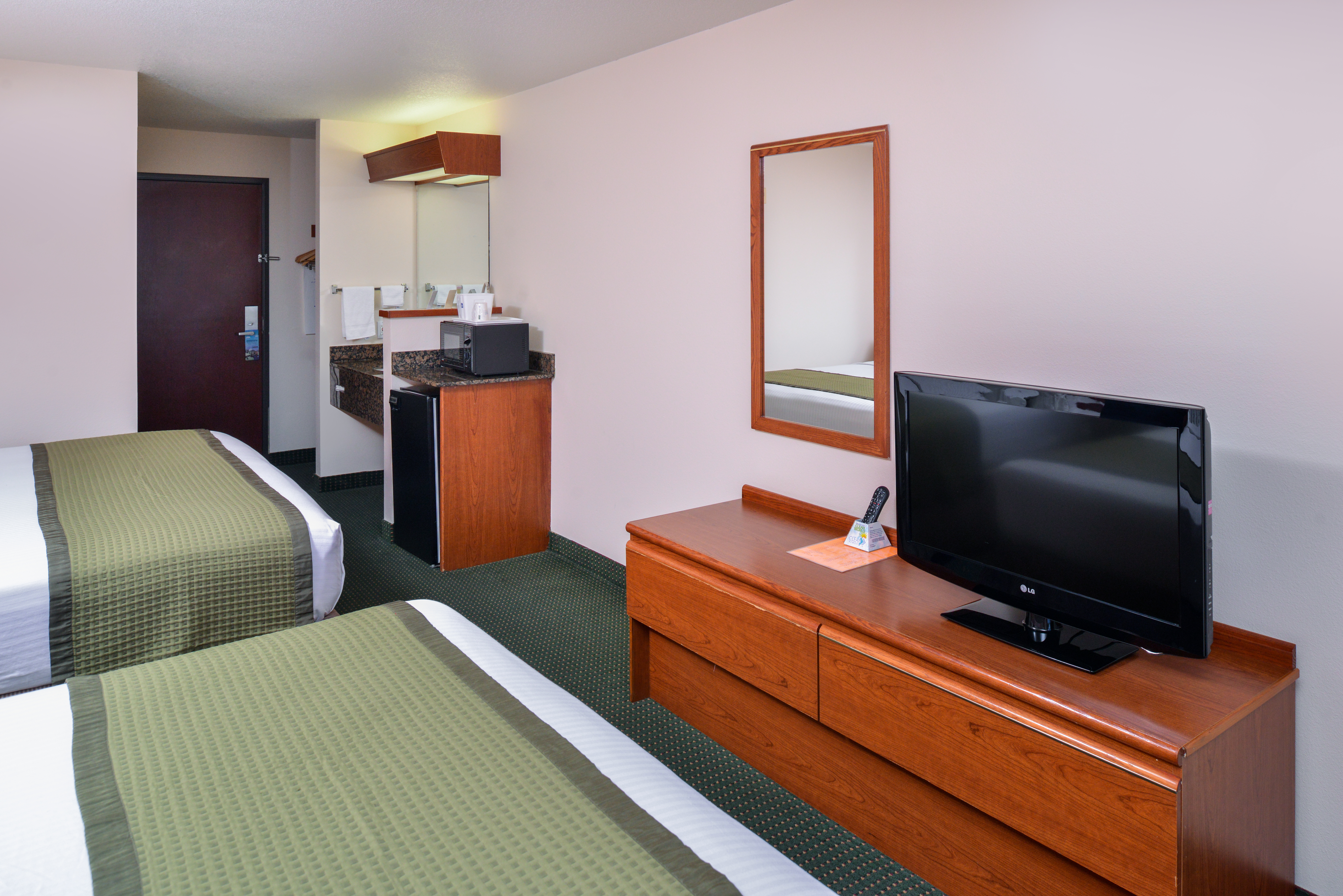 Guest room at the Travelodge Suites by Wyndham Newberg in Newberg, Oregon