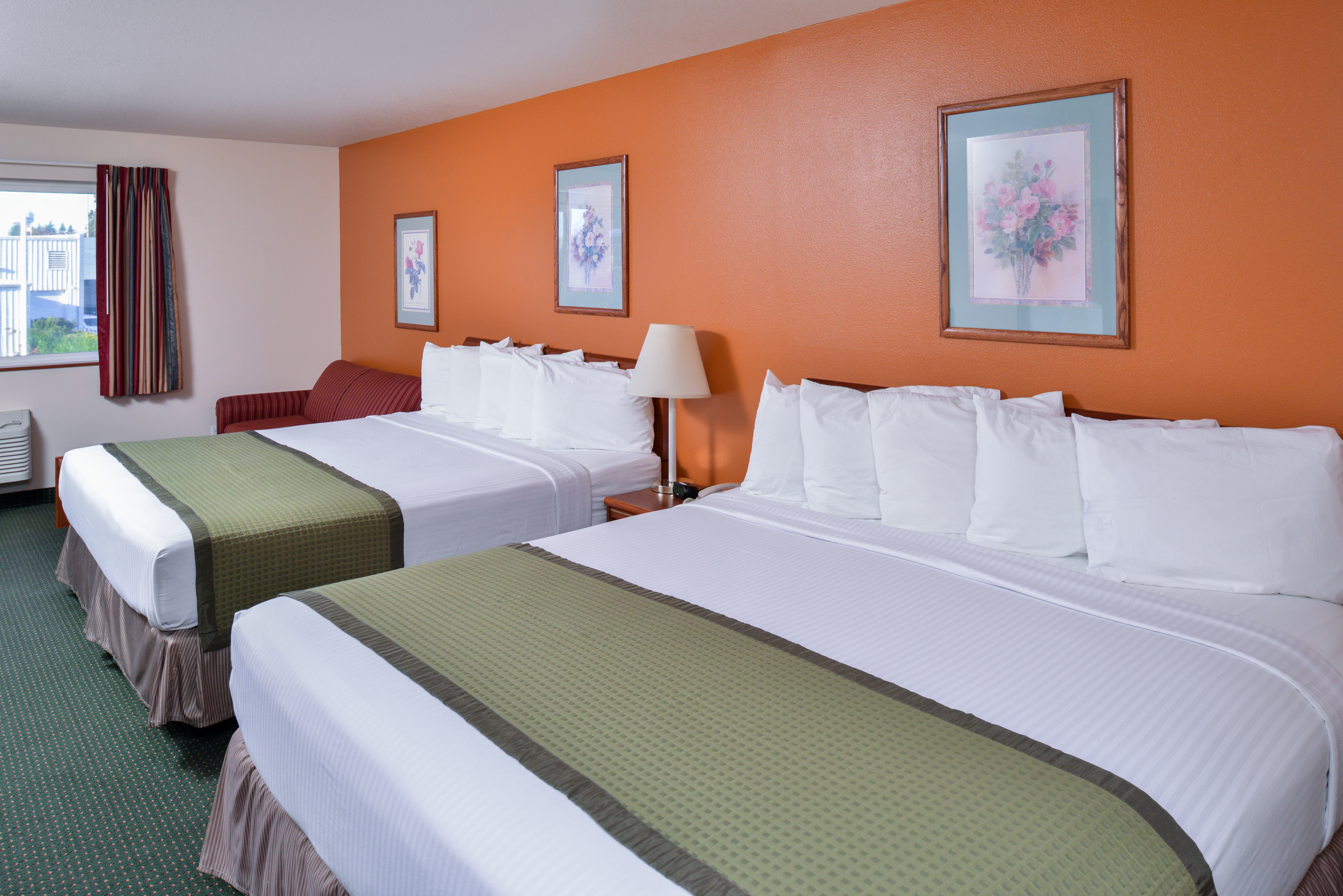 Guest room at the Travelodge Suites by Wyndham Newberg in Newberg, Oregon