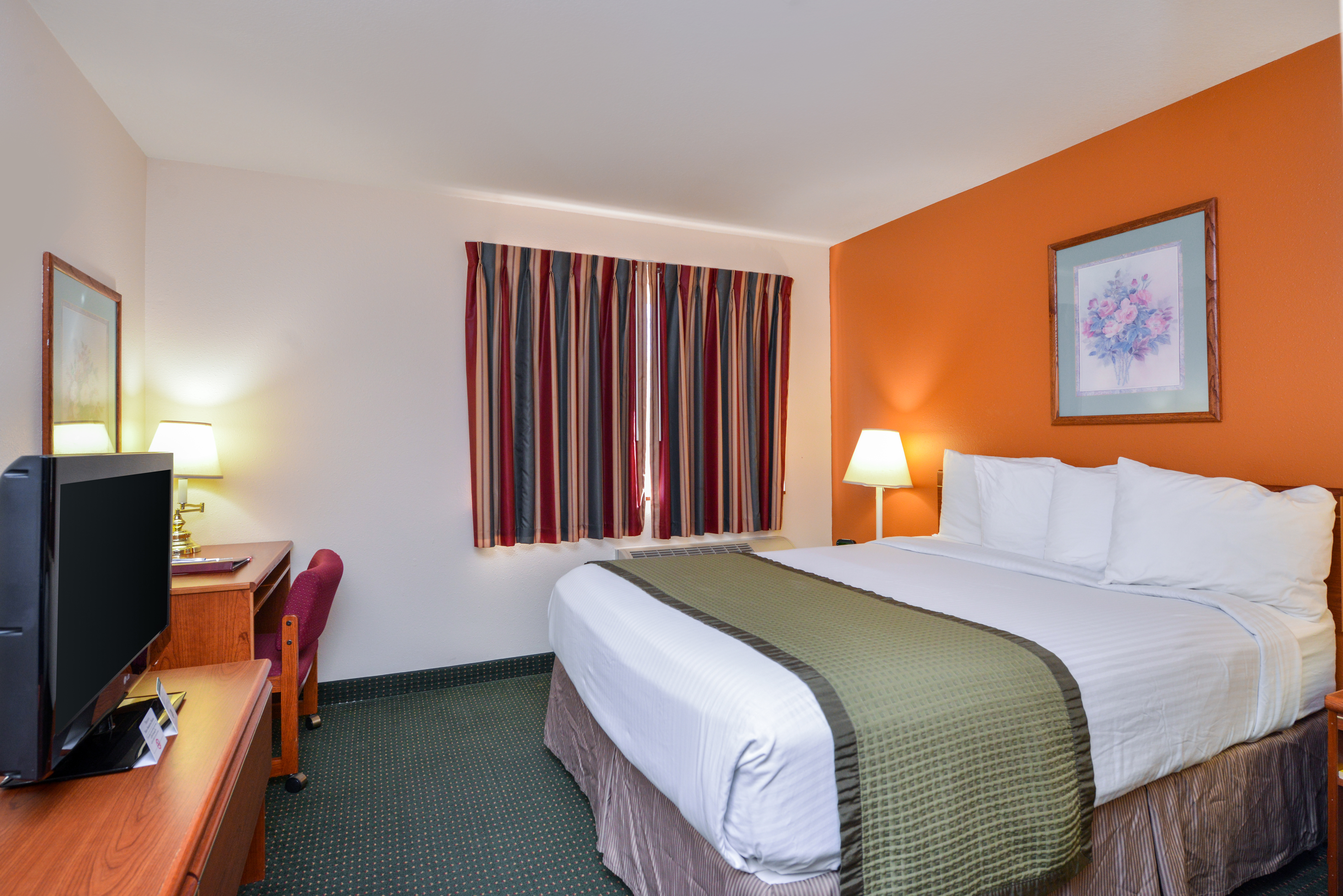 Guest room at the Travelodge Suites by Wyndham Newberg in Newberg, Oregon
