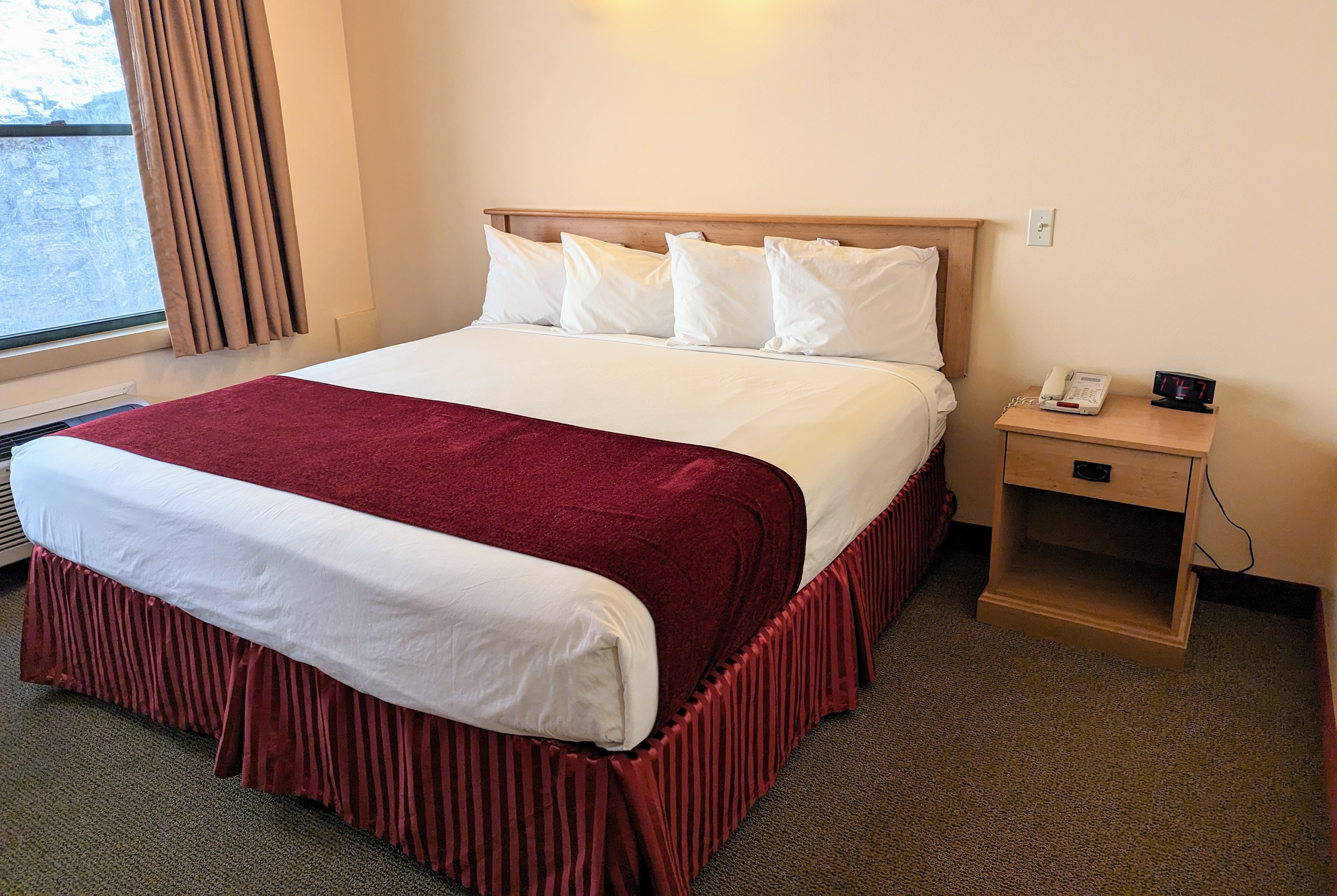 Guest room at the Travelodge Inn & Suites by Wyndham Deadwood in Deadwood, South Dakota
