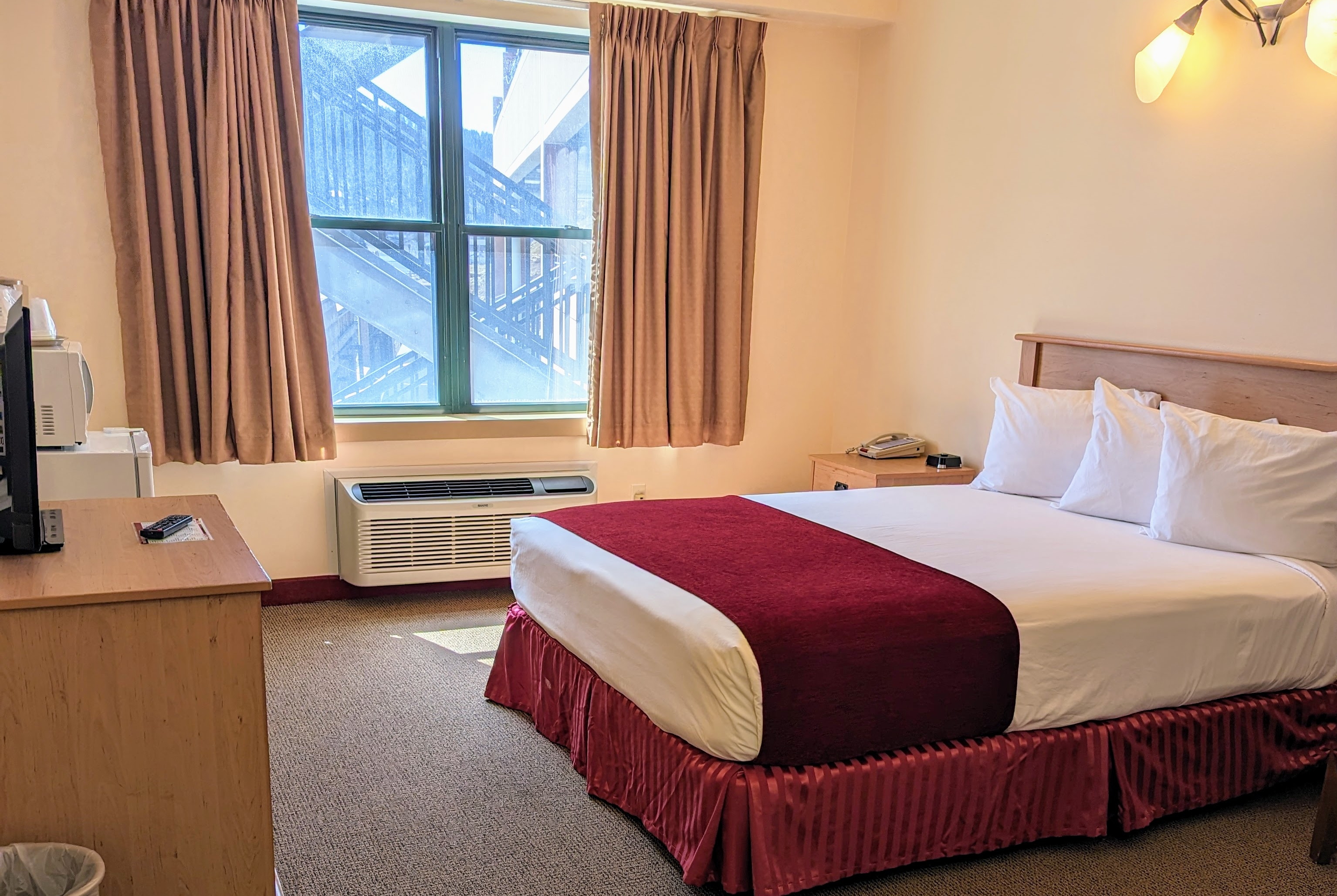 Guest room at the Travelodge Inn & Suites by Wyndham Deadwood in Deadwood, South Dakota