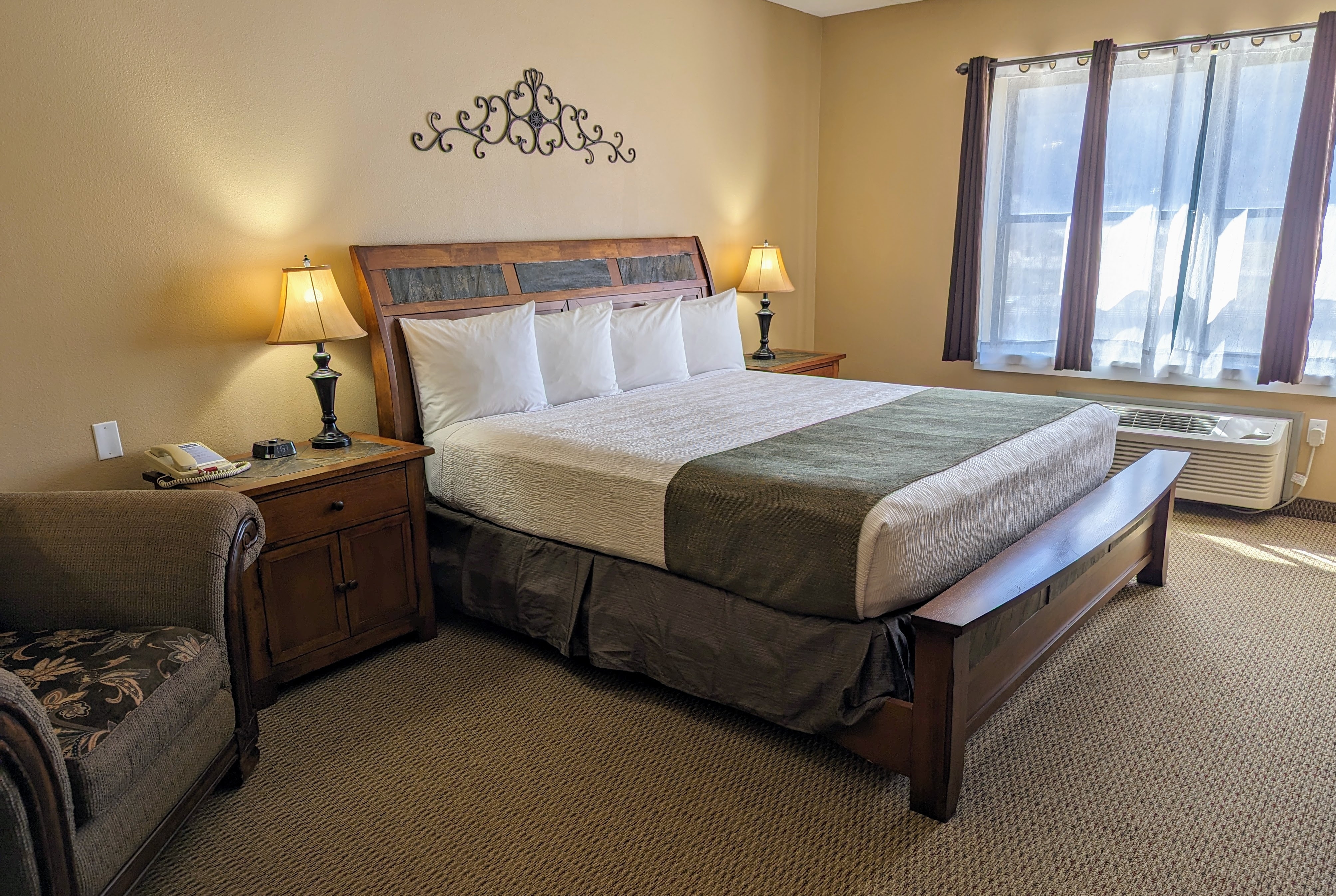 Guest room at the Travelodge Inn & Suites by Wyndham Deadwood in Deadwood, South Dakota