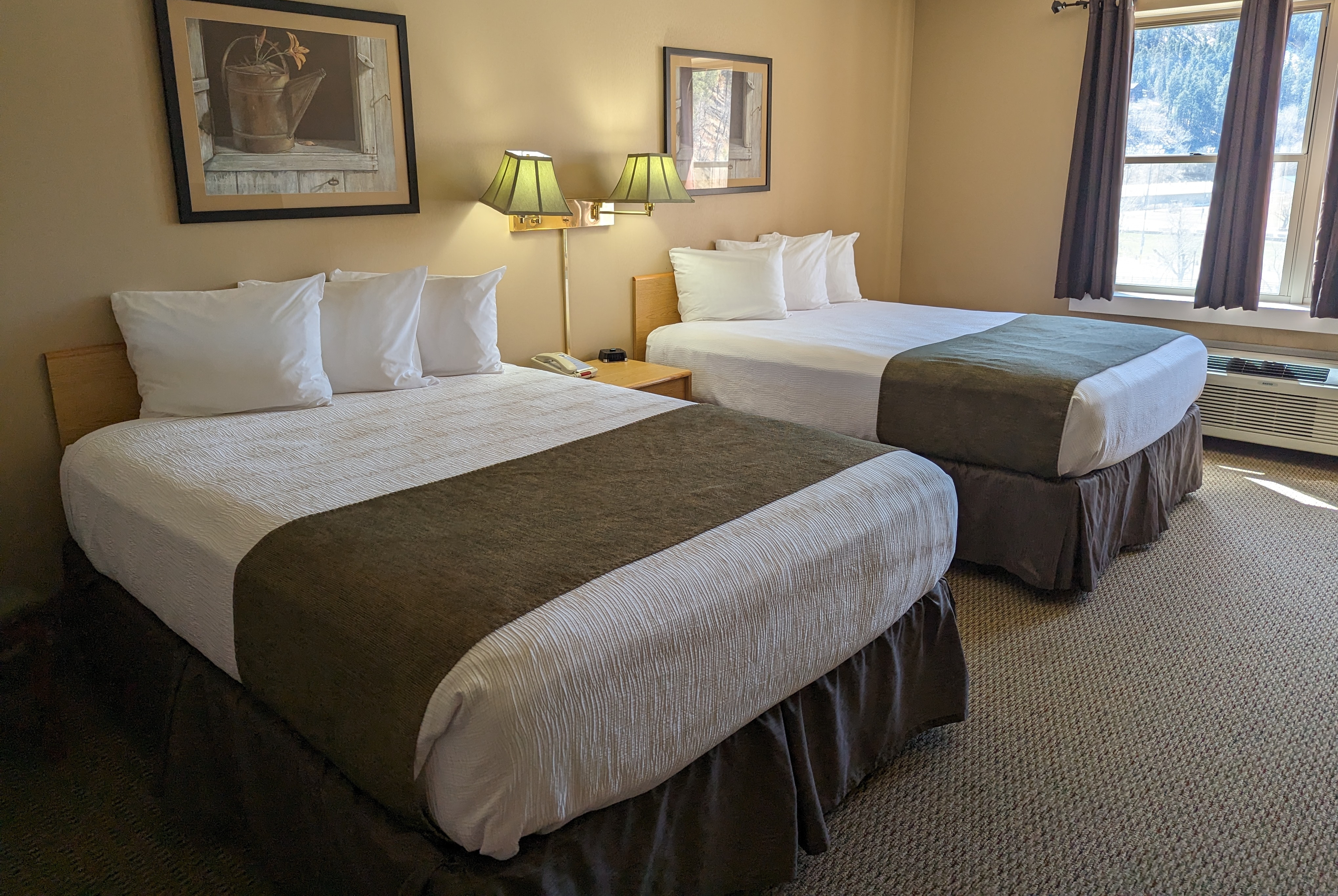 Guest room at the Travelodge Inn & Suites by Wyndham Deadwood in Deadwood, South Dakota