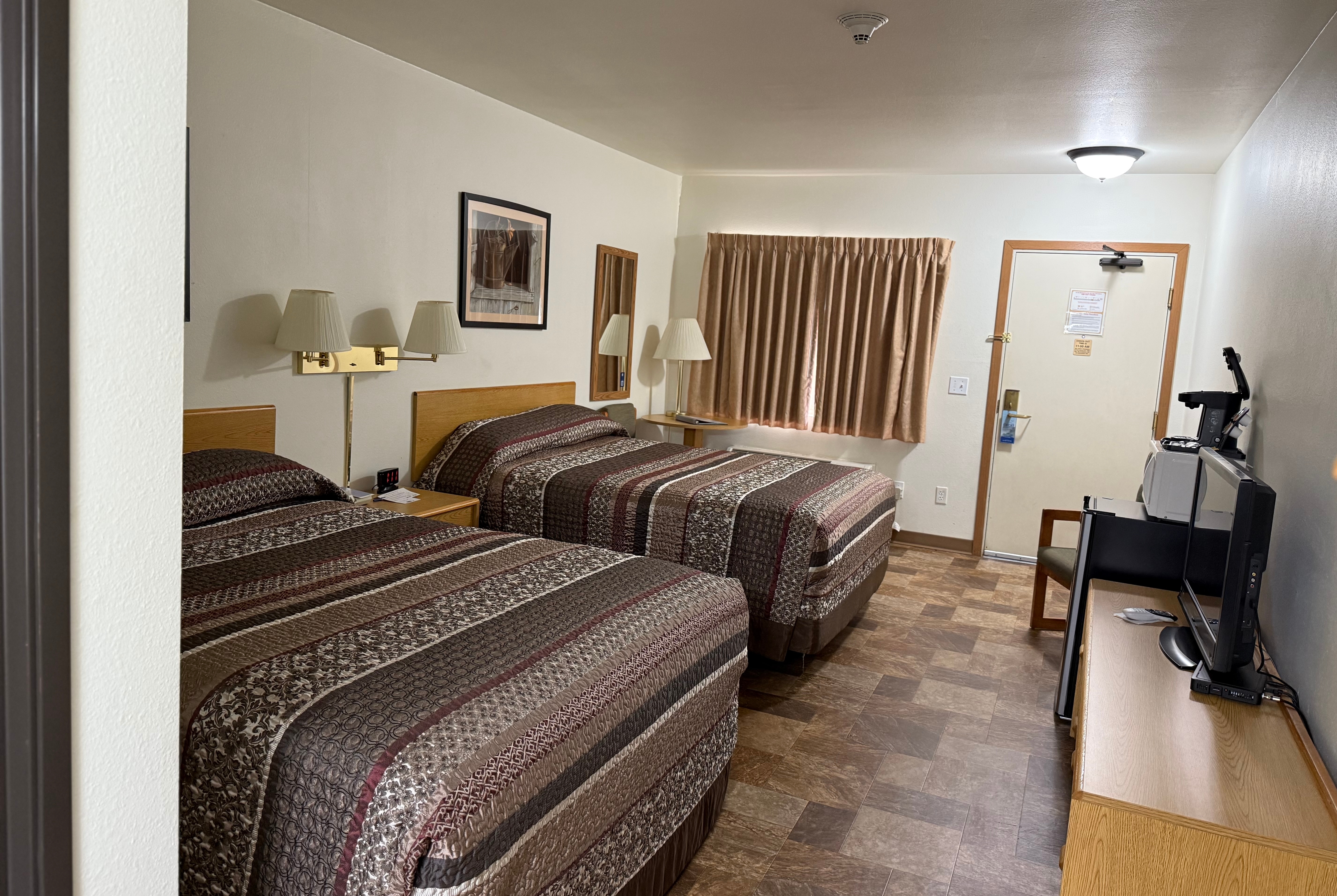 Guest room at the Travelodge Inn & Suites by Wyndham Deadwood in Deadwood, South Dakota