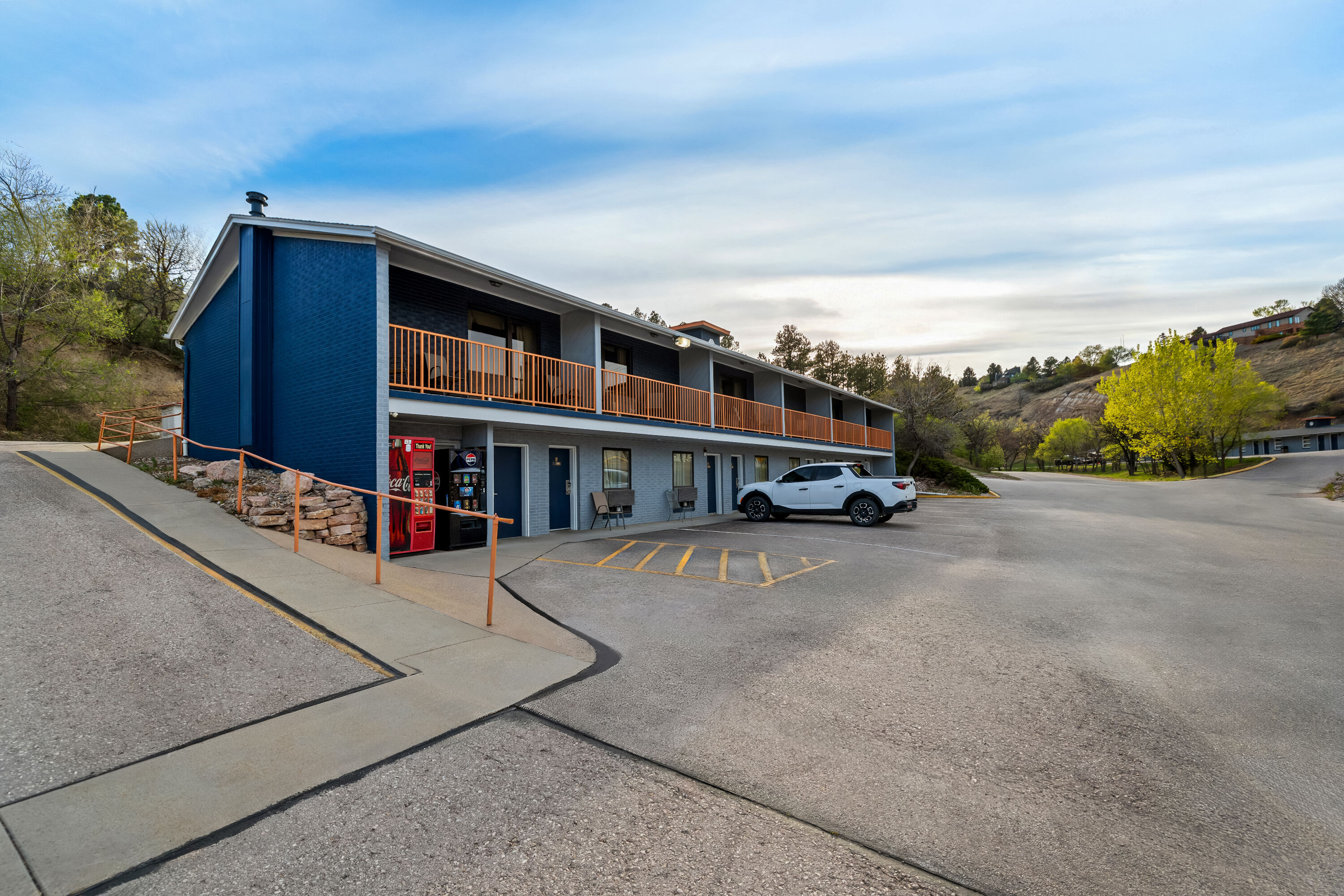 Exterior Day Image of Travelodge by Wyndham Rapid City hotel in Rapid City, South Dakota