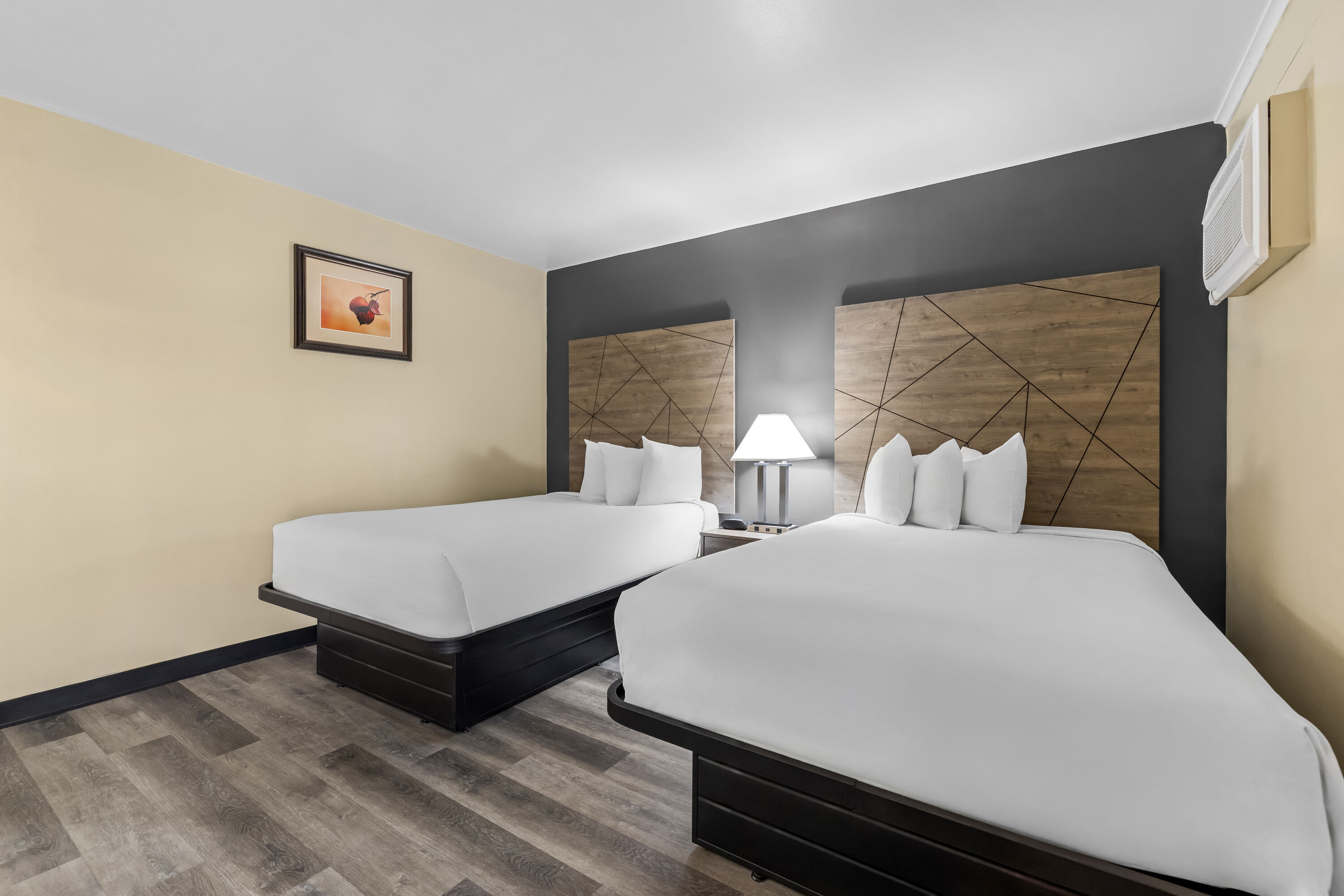 Double bed guest room at the Travelodge by Wyndham Rapid City in Rapid City, South Dakota