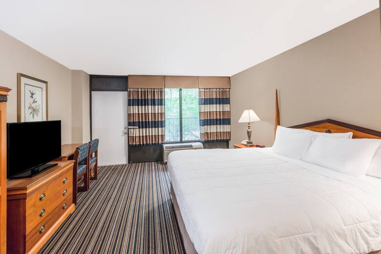 Guest room at the Travelodge Inn & Suites Gatlinburg On The River in Gatlinburg, Tennessee