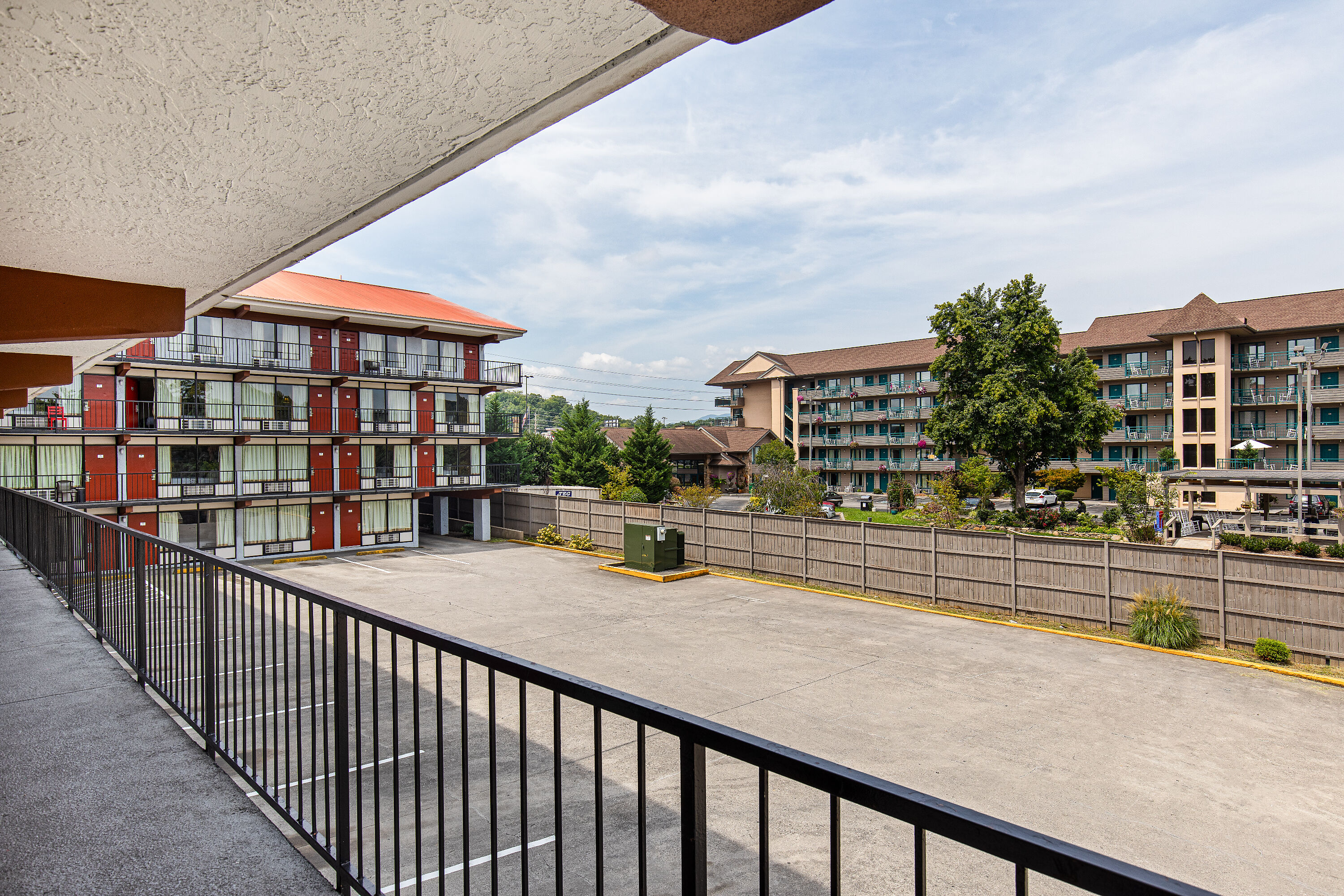 Exterior Day Image of Americana Inn a Travelodge by Wyndham hotel in Pigeon Forge, Tennessee