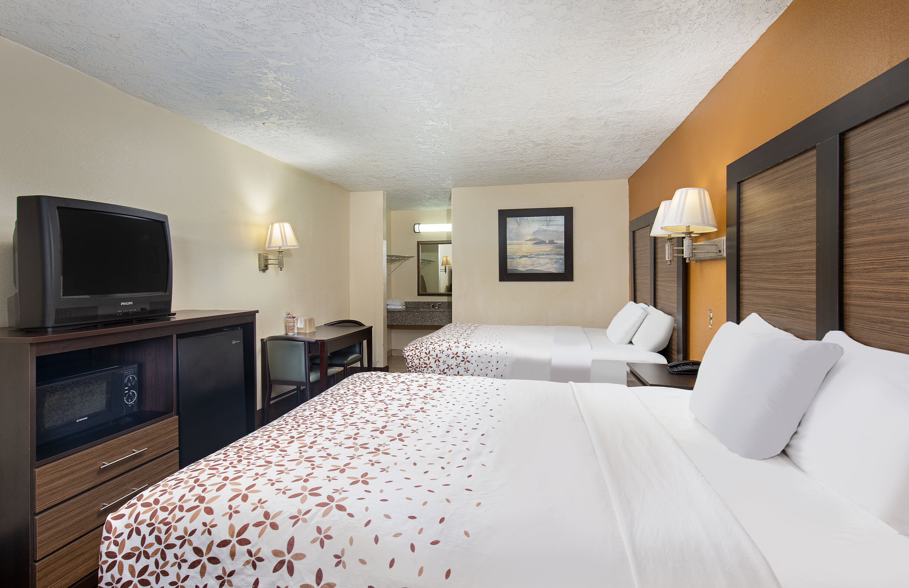 Guest room at the Americana Inn a Travelodge by Wyndham in Pigeon Forge, Tennessee