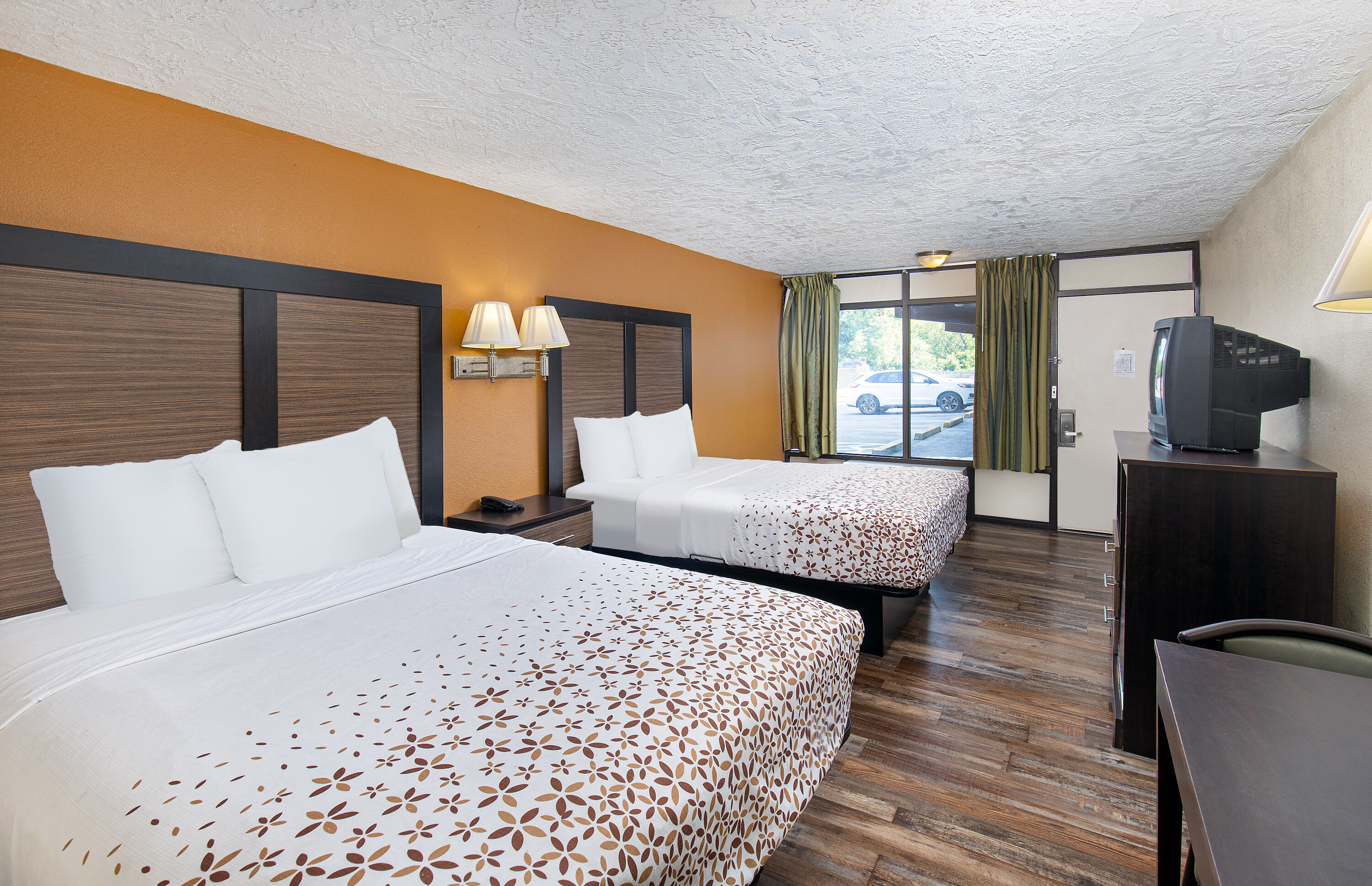 Guest room at the Americana Inn a Travelodge by Wyndham in Pigeon Forge, Tennessee