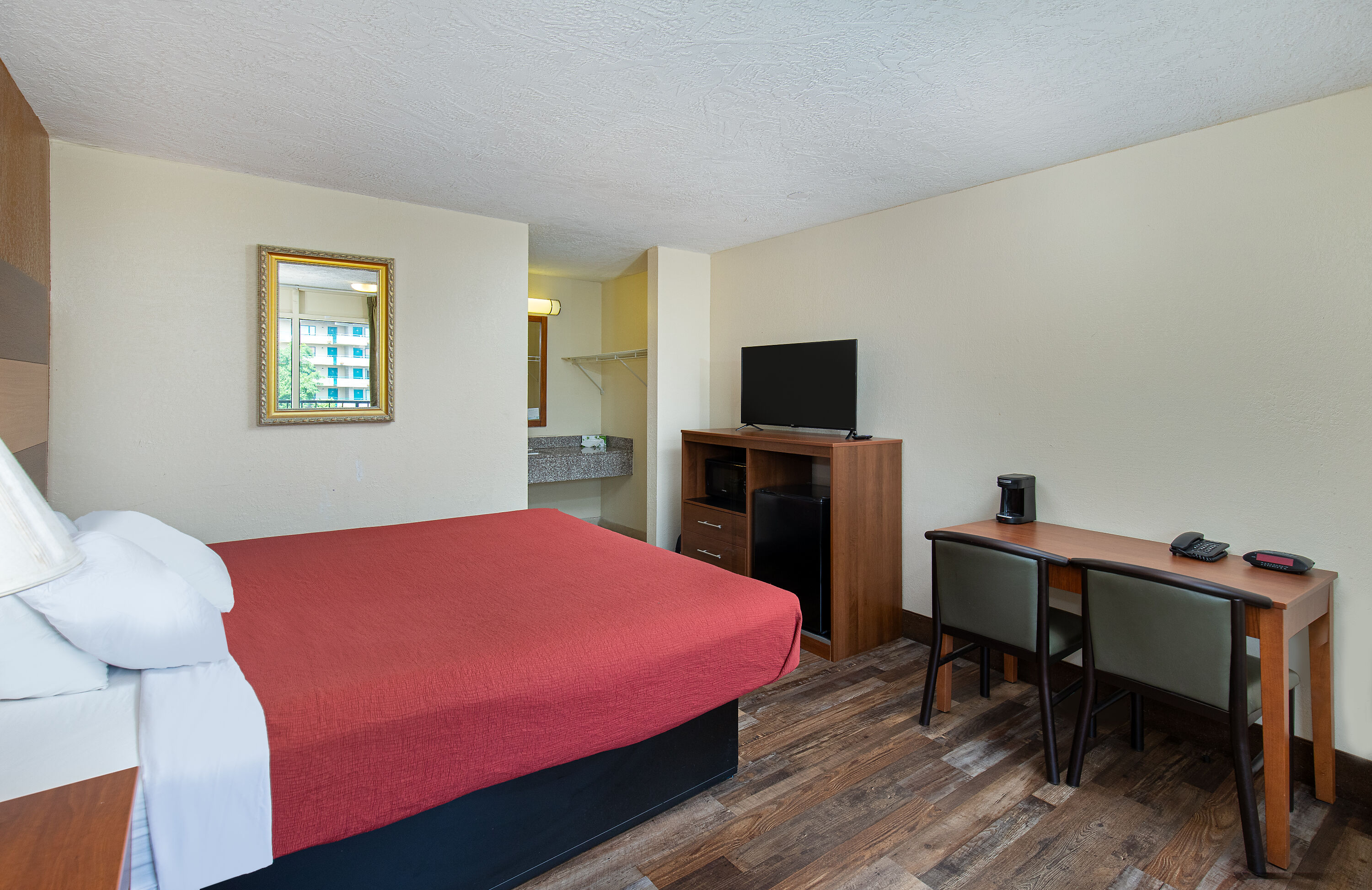 Guest room at the Americana Inn a Travelodge by Wyndham in Pigeon Forge, Tennessee