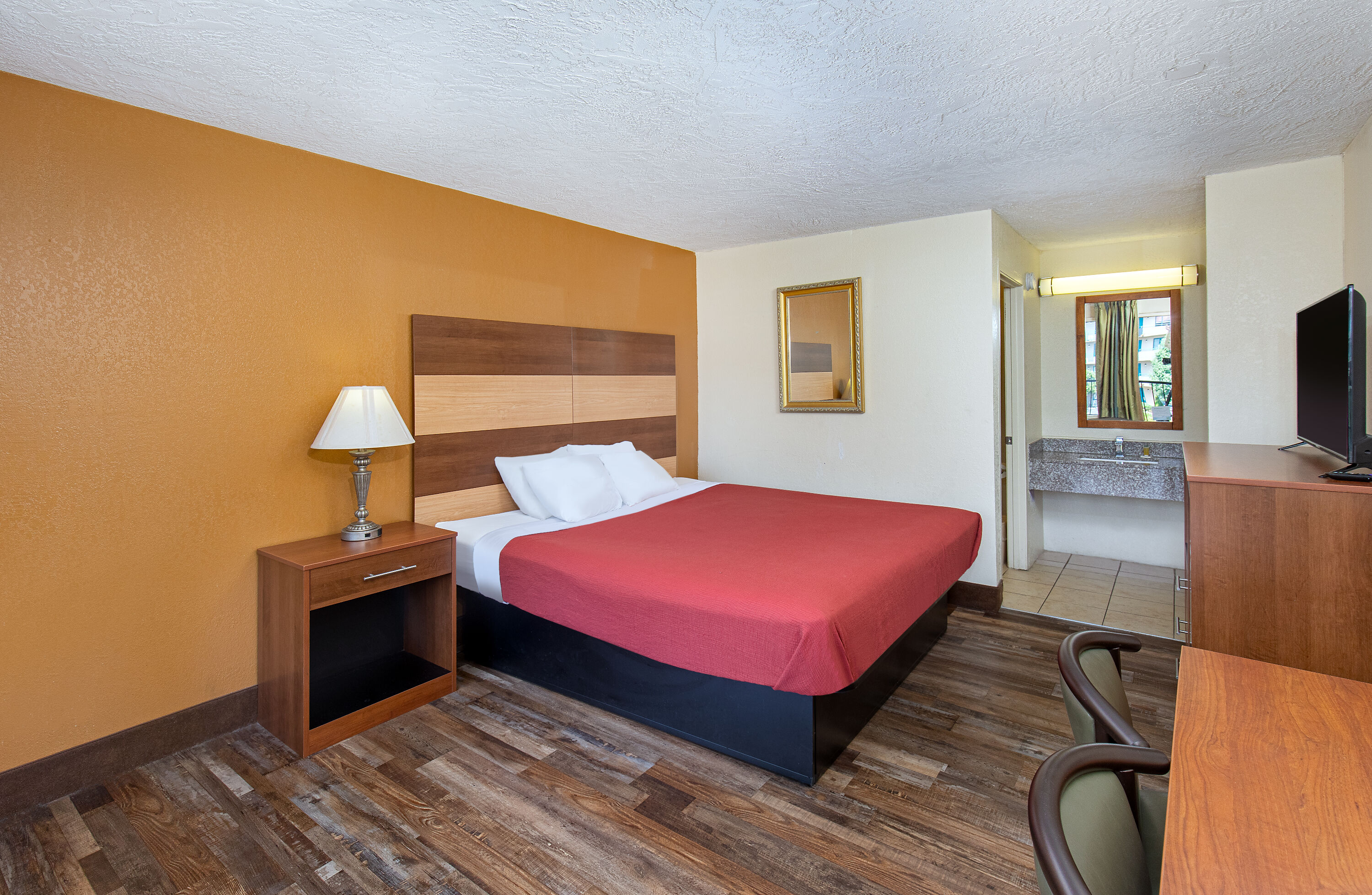 Guest room at the Americana Inn a Travelodge by Wyndham in Pigeon Forge, Tennessee
