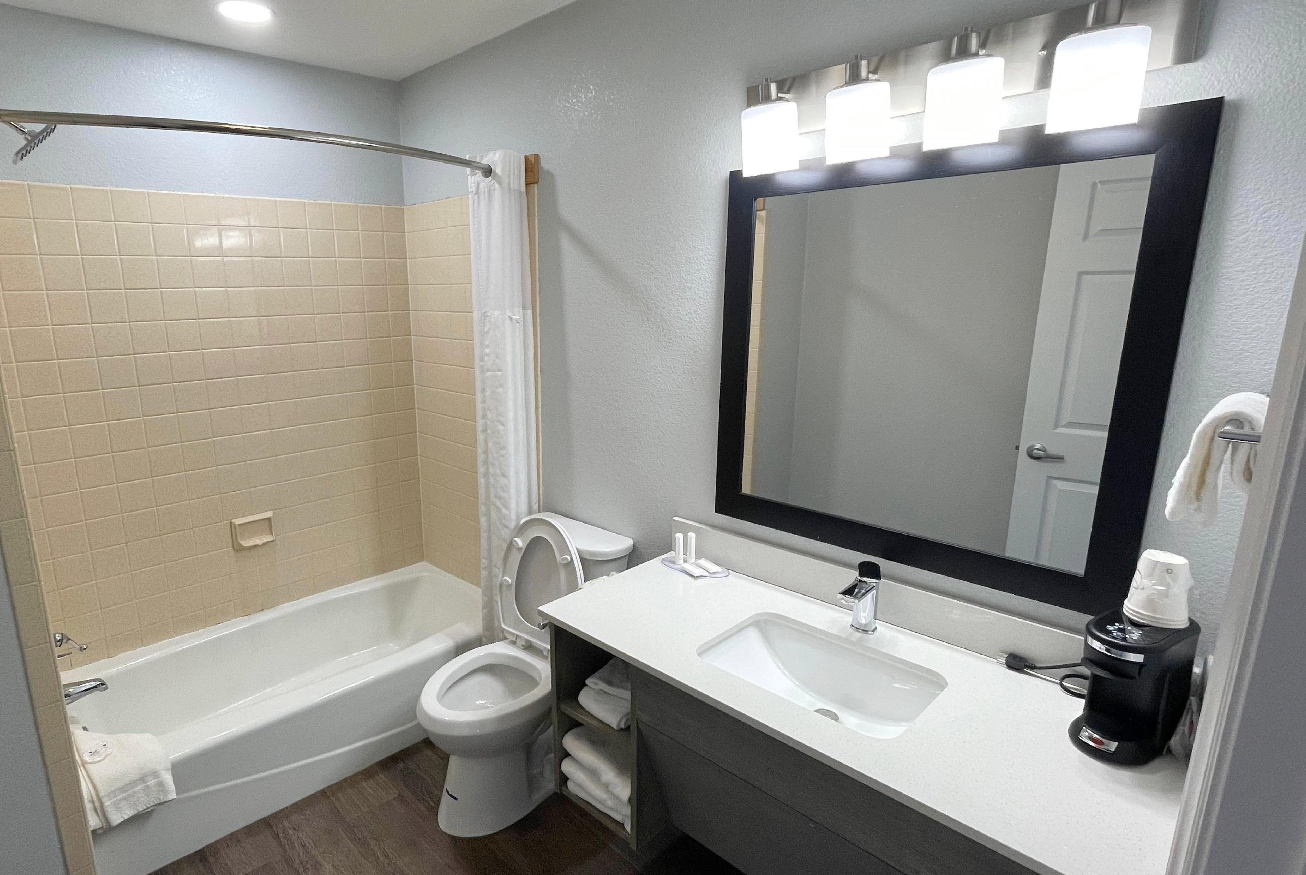 Guest room bath at the Travelodge by Wyndham Pigeon Forge Dollywood Lane in Pigeon Forge, Tennessee