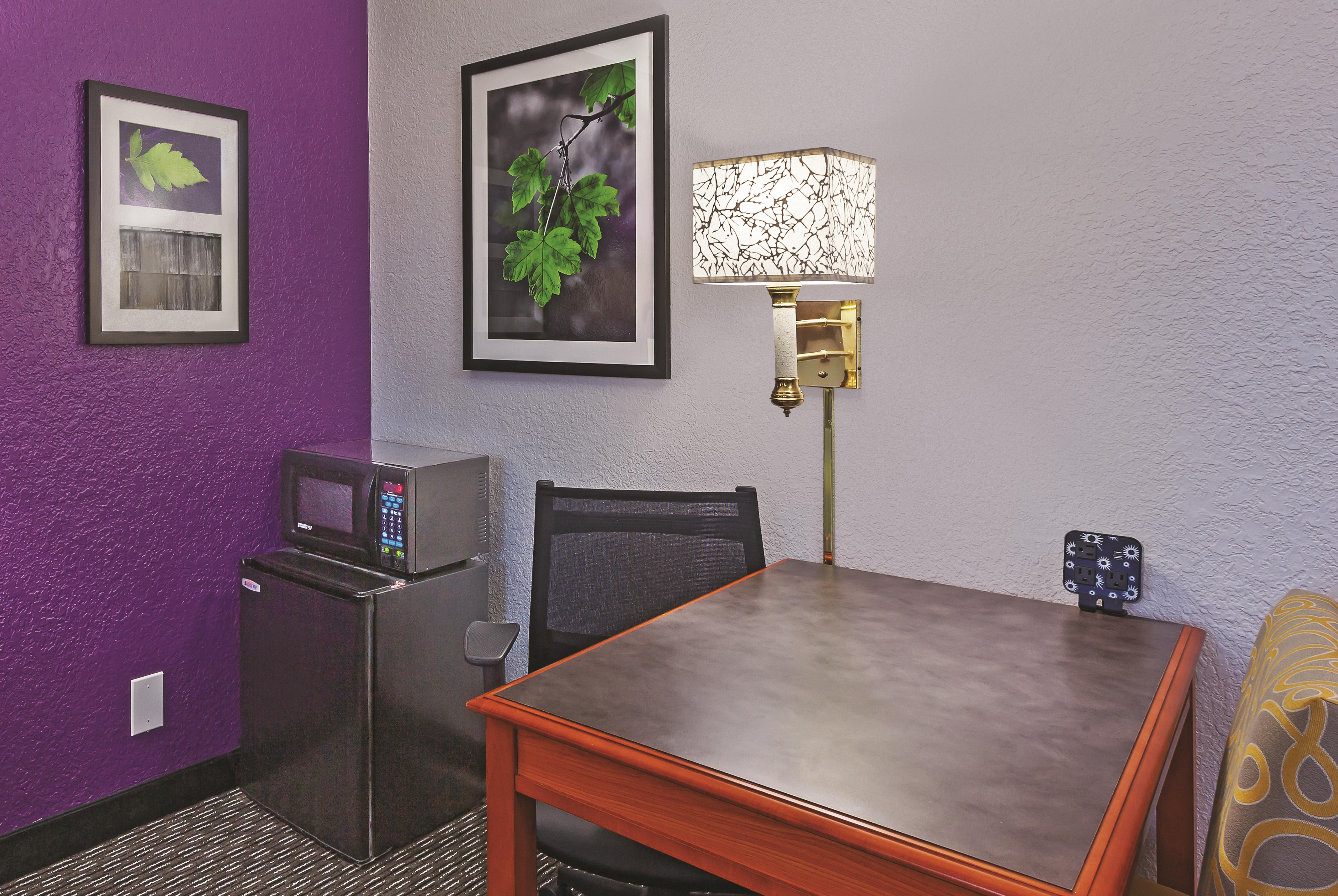 Guest room at the Travelodge by Wyndham Houston Cy-Fair in Houston, Texas