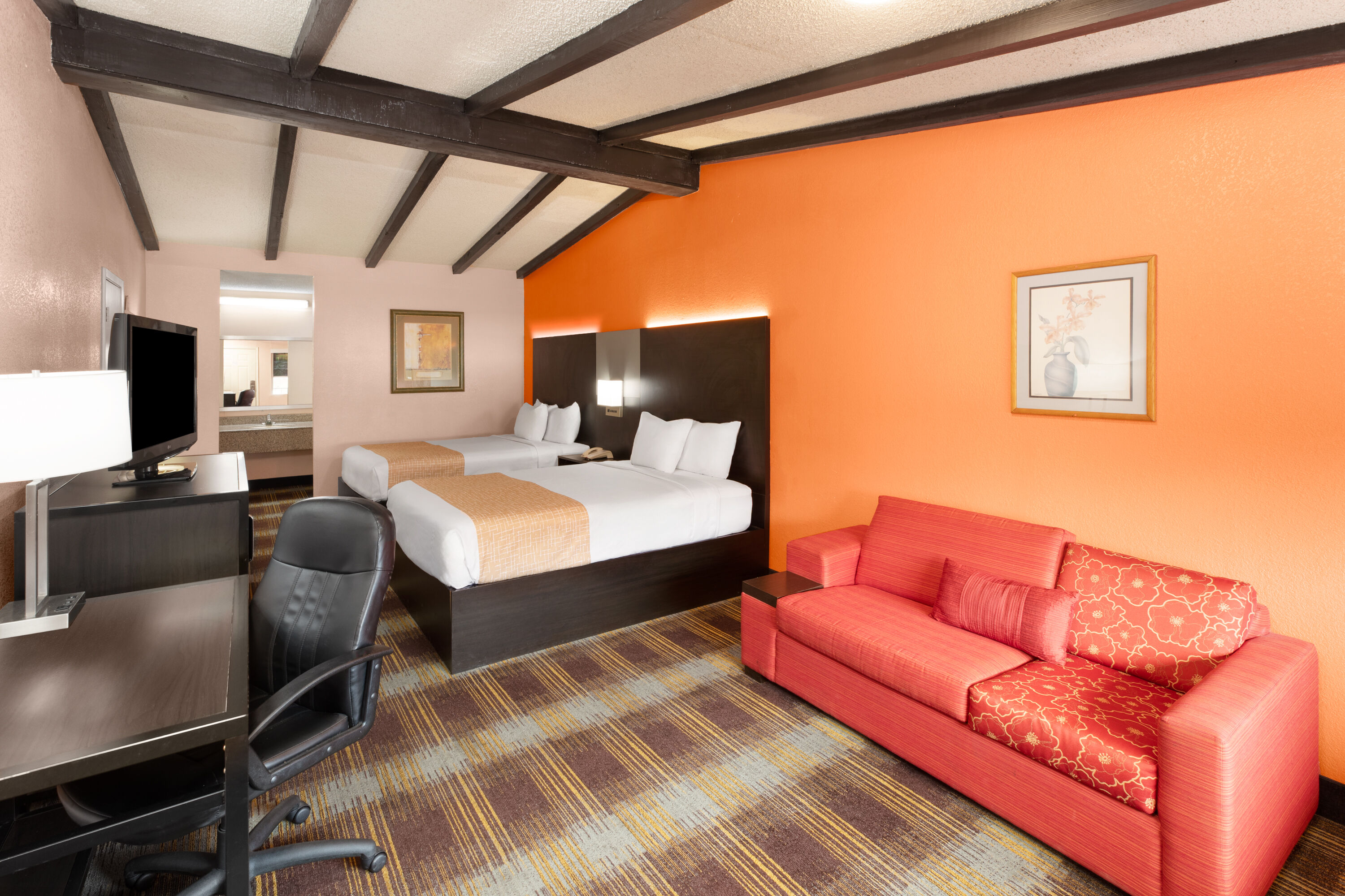 Guest room at the Travelodge by Wyndham New Braunfels in New Braunfels, Texas