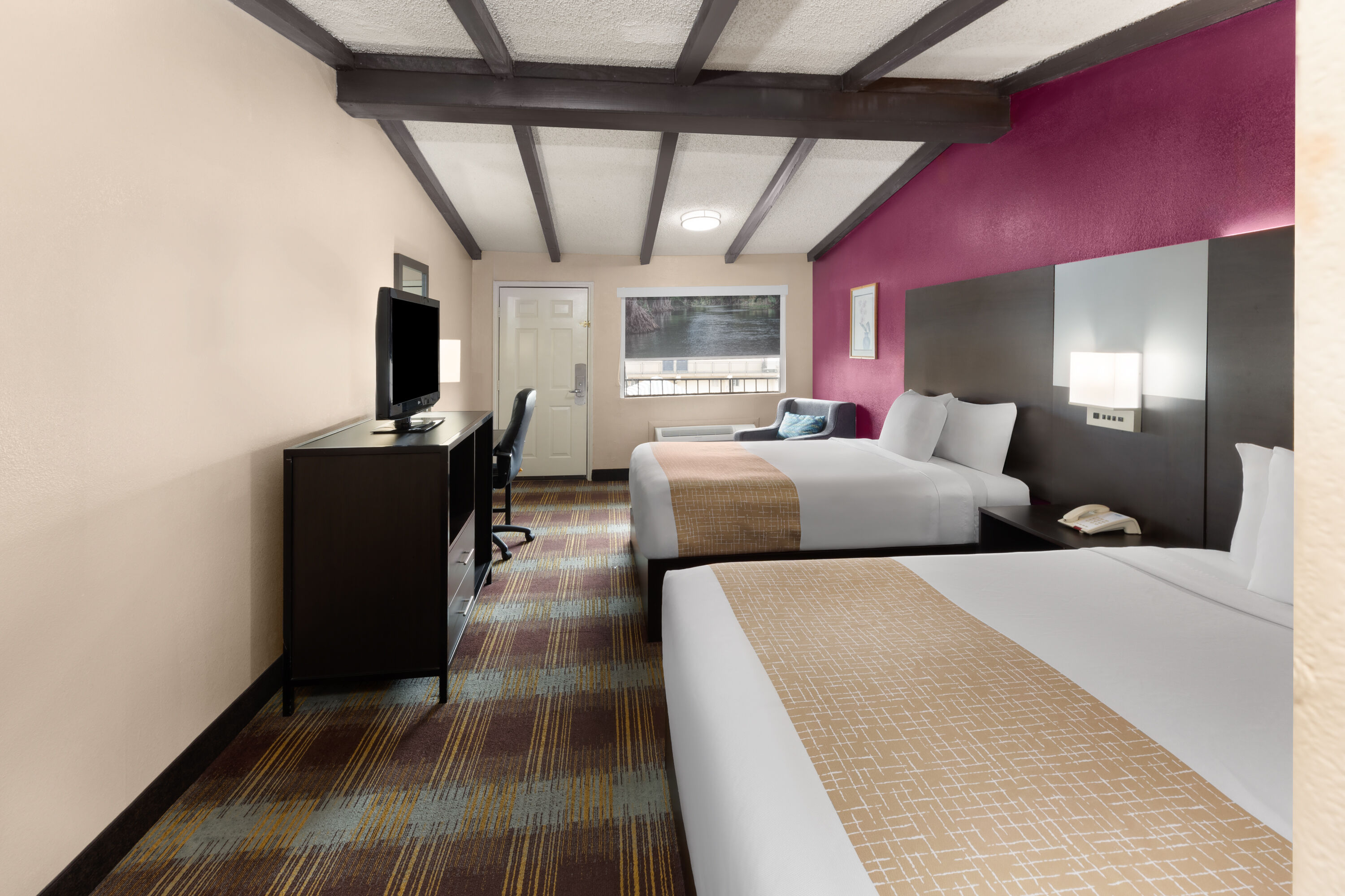 Guest room at the Travelodge by Wyndham New Braunfels in New Braunfels, Texas