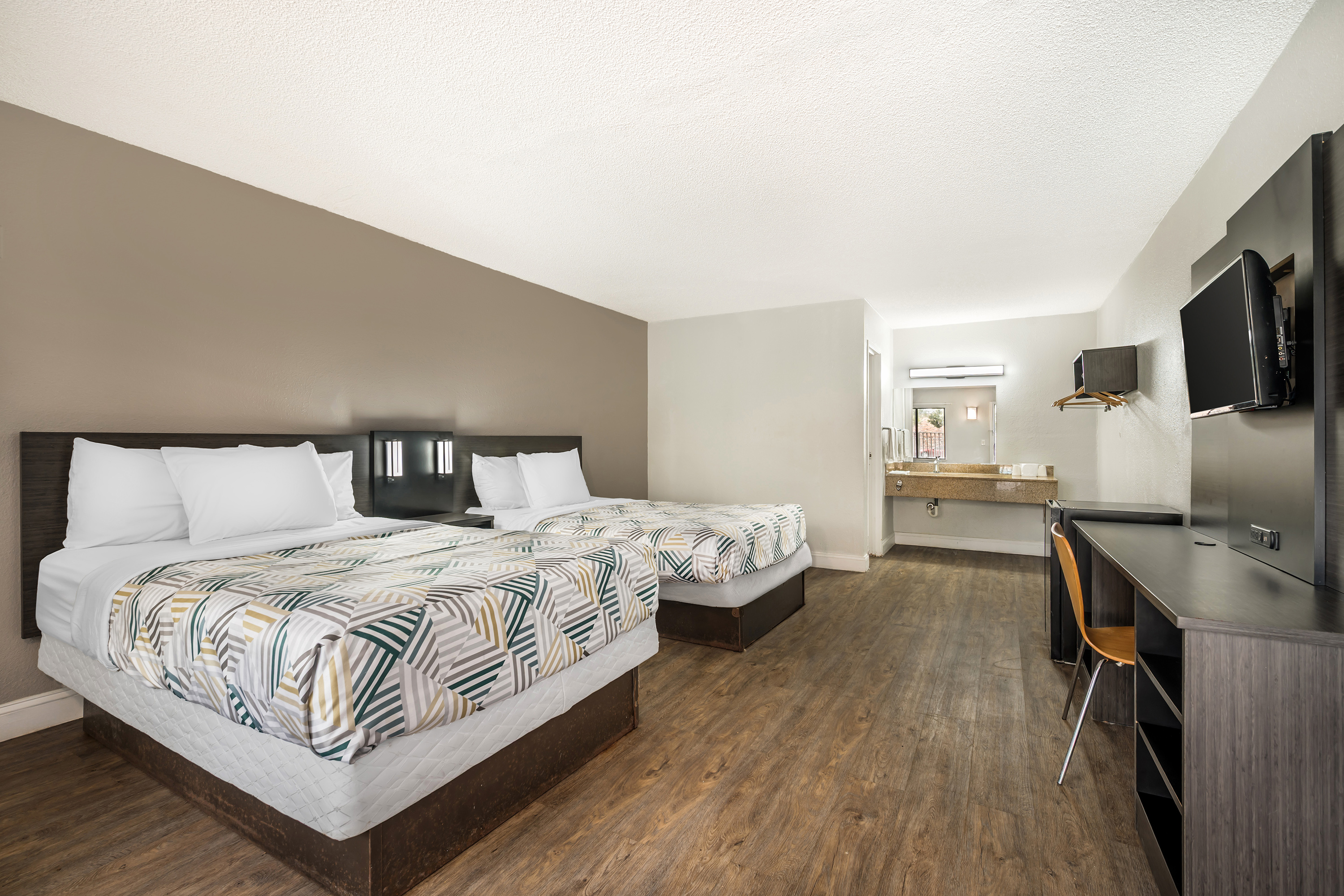 Guest room at the Travelodge by Wyndham Norfolk Airport in Norfolk, Virginia