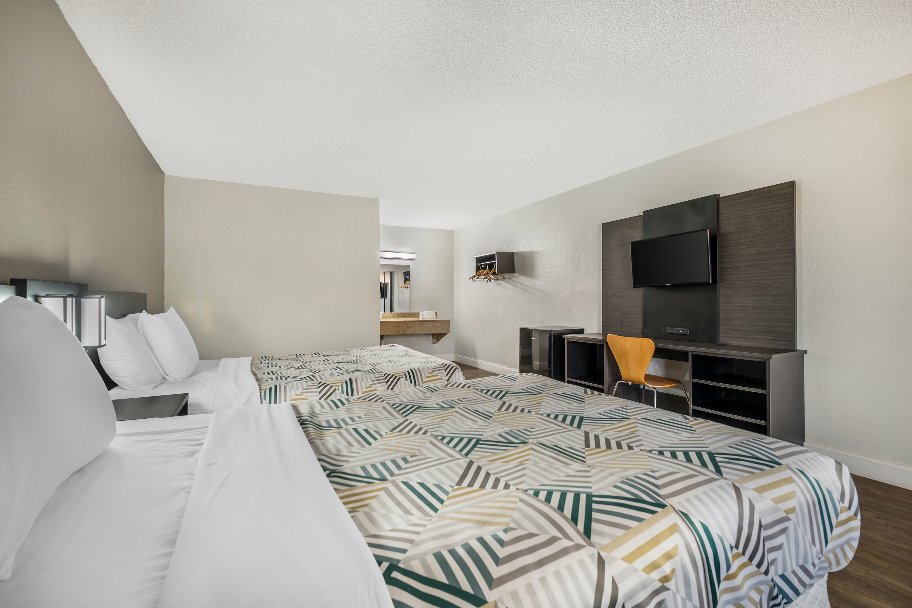 Guest room at the Travelodge by Wyndham Norfolk Airport in Norfolk, Virginia