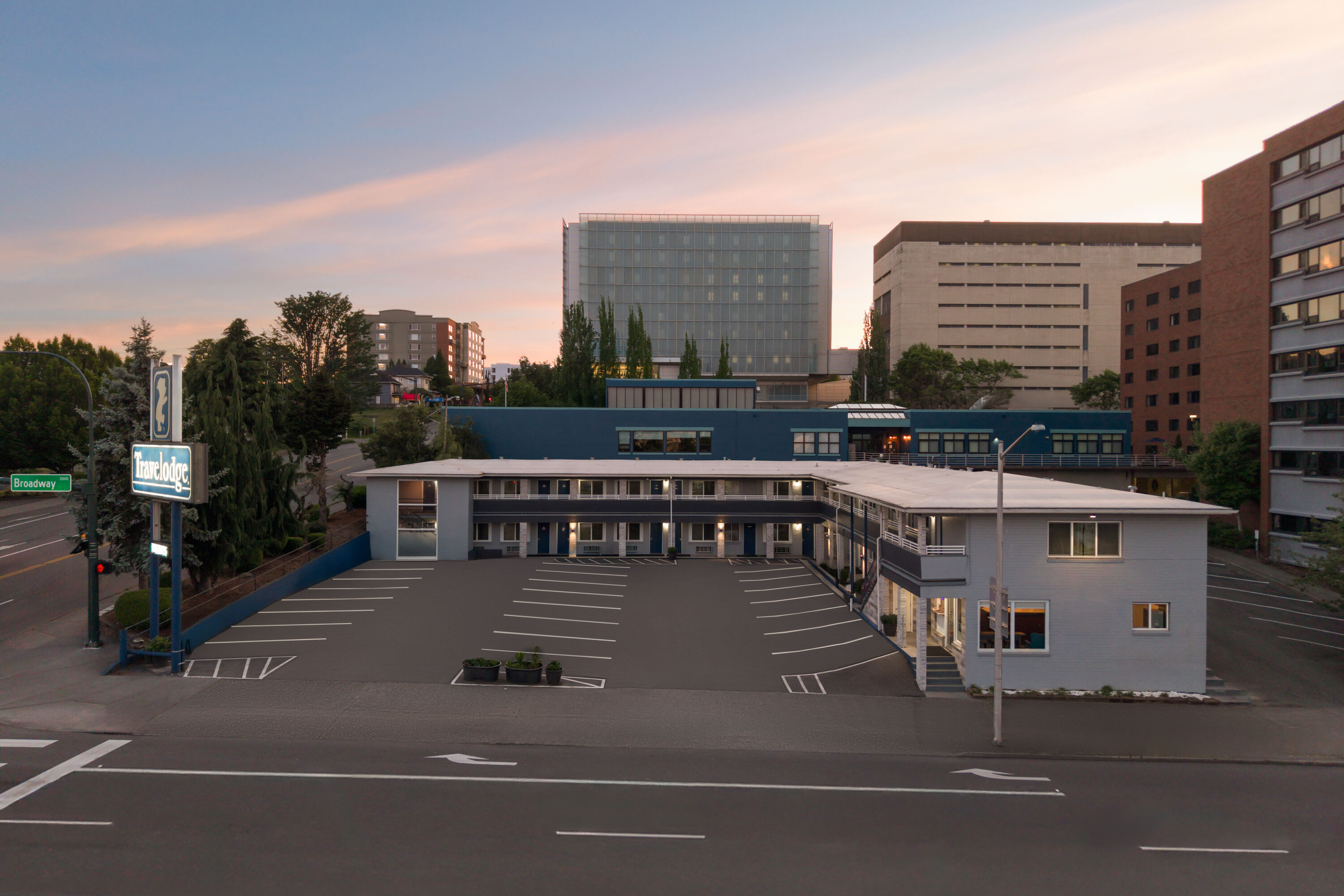 Exterior Dusk Image of Travelodge by Wyndham Everett City Center hotel in Everett, Washington