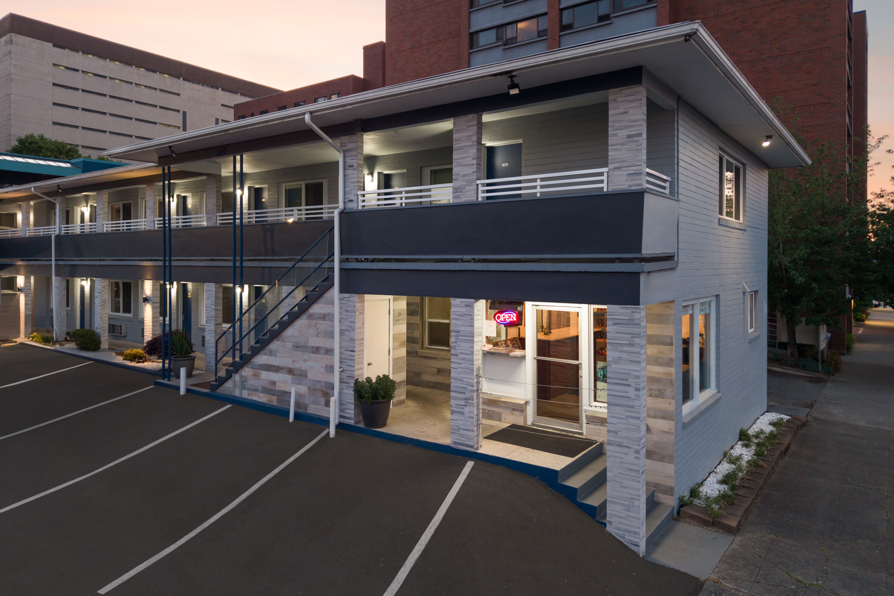 Exterior Dusk Image of Travelodge by Wyndham Everett City Center hotel in Everett, Washington