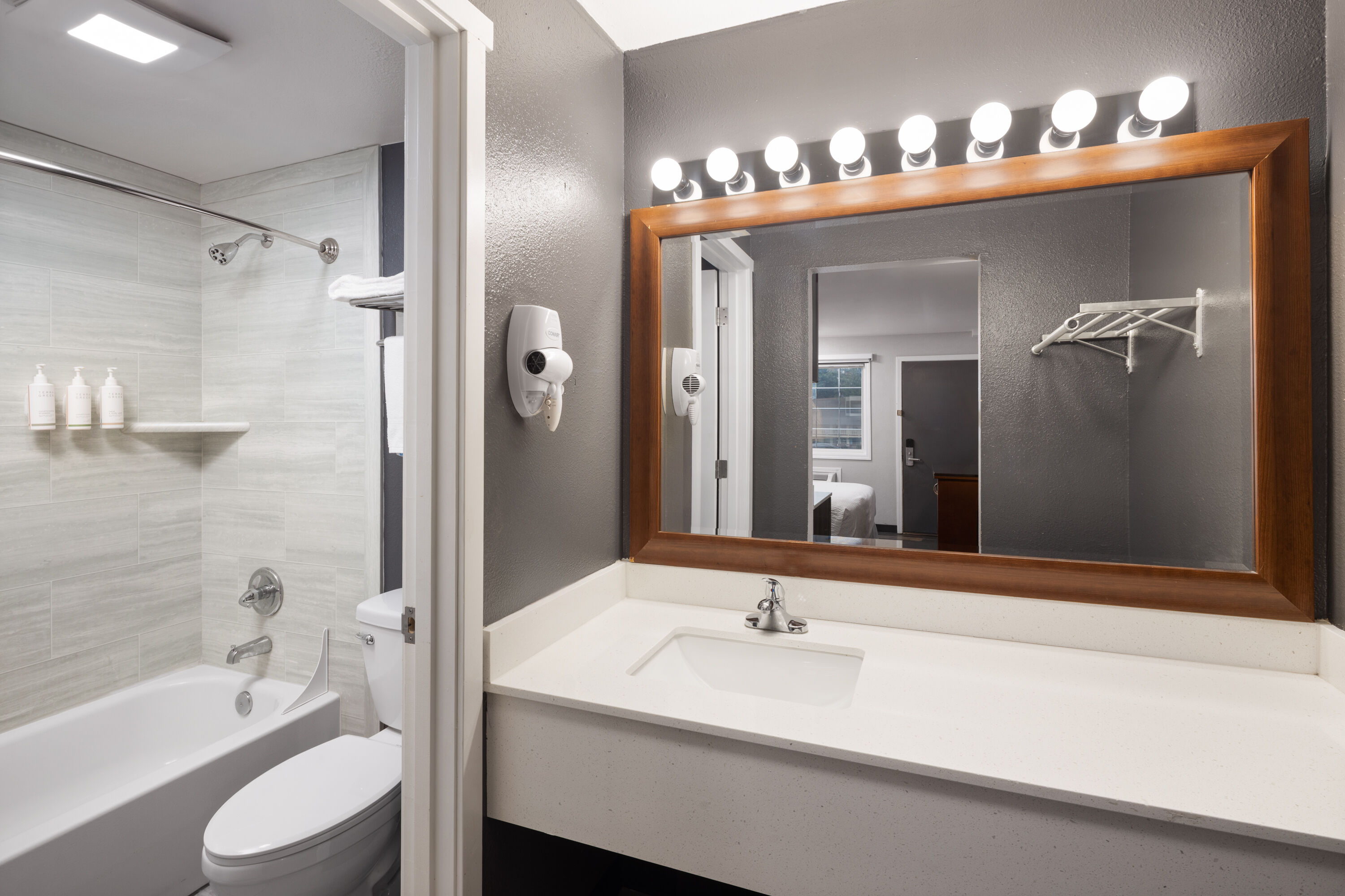Guest room bath at the Basecamp Puyallup a Travelodge by Wyndham in Puyallup, Washington