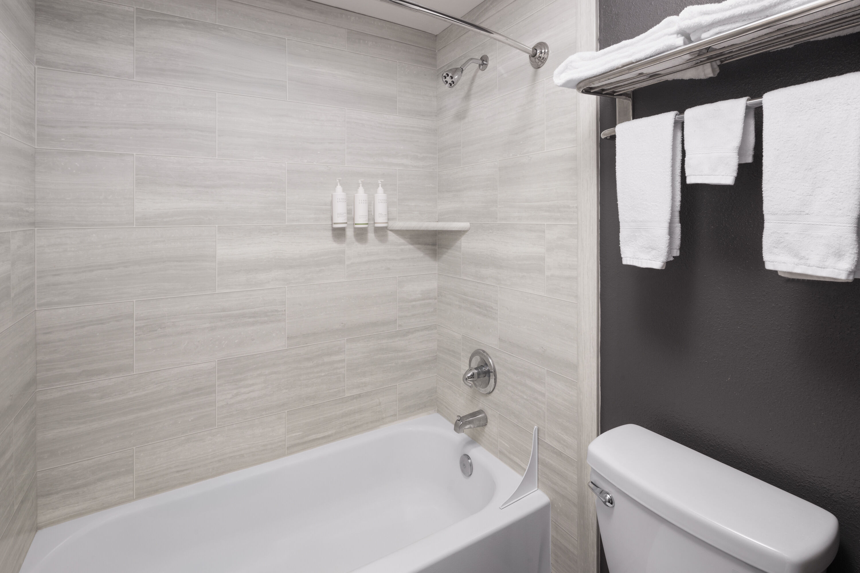 Guest room bath at the Basecamp Puyallup a Travelodge by Wyndham in Puyallup, Washington