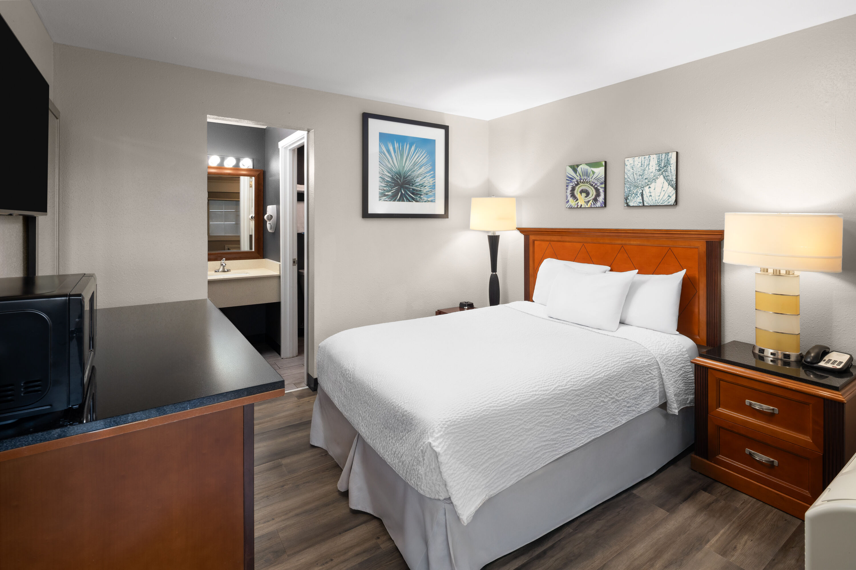 Guest room at the Basecamp Puyallup a Travelodge by Wyndham in Puyallup, Washington