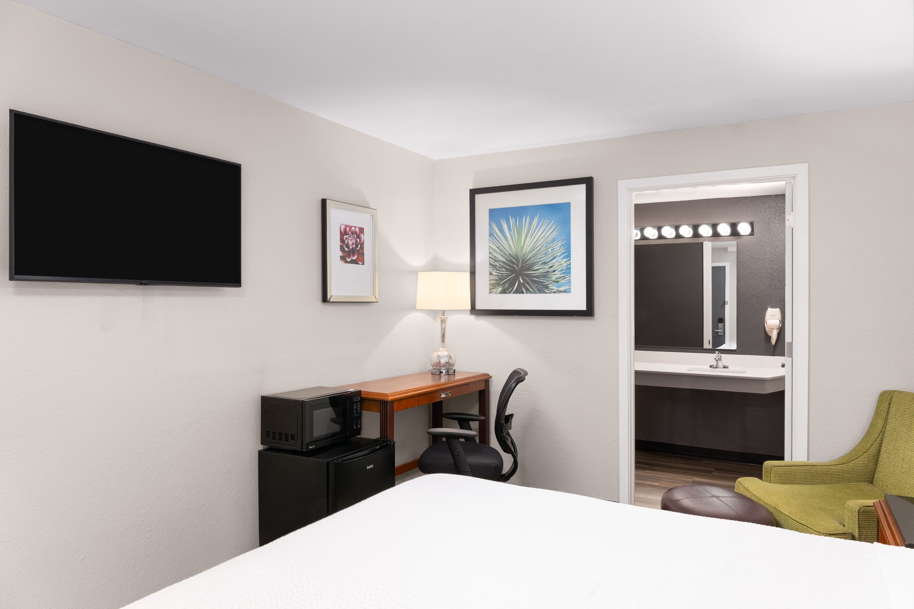 Guest room at the Basecamp Puyallup a Travelodge by Wyndham in Puyallup, Washington