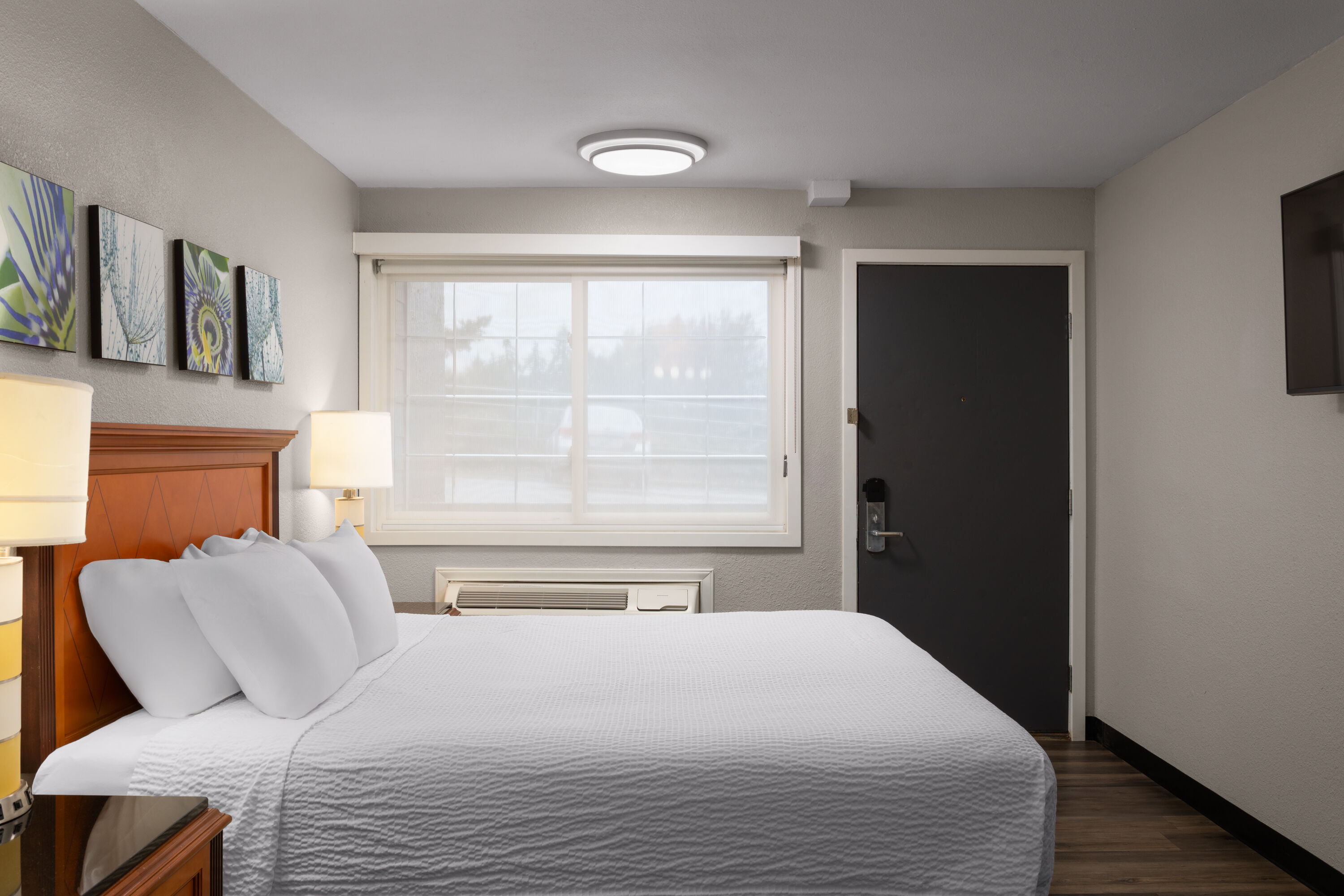 Guest room at the Basecamp Puyallup a Travelodge by Wyndham in Puyallup, Washington