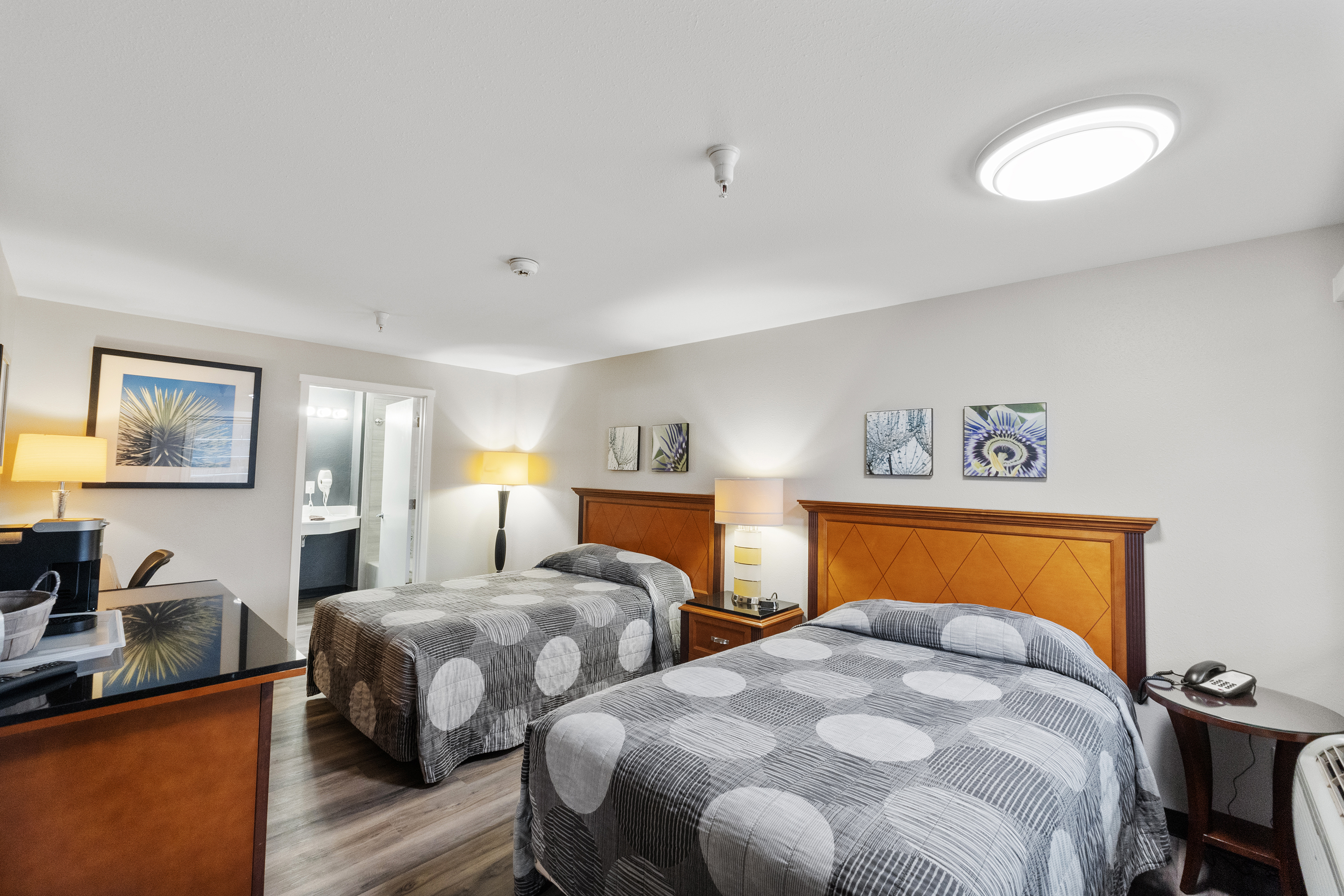 Guest room at the Basecamp Puyallup a Travelodge by Wyndham in Puyallup, Washington