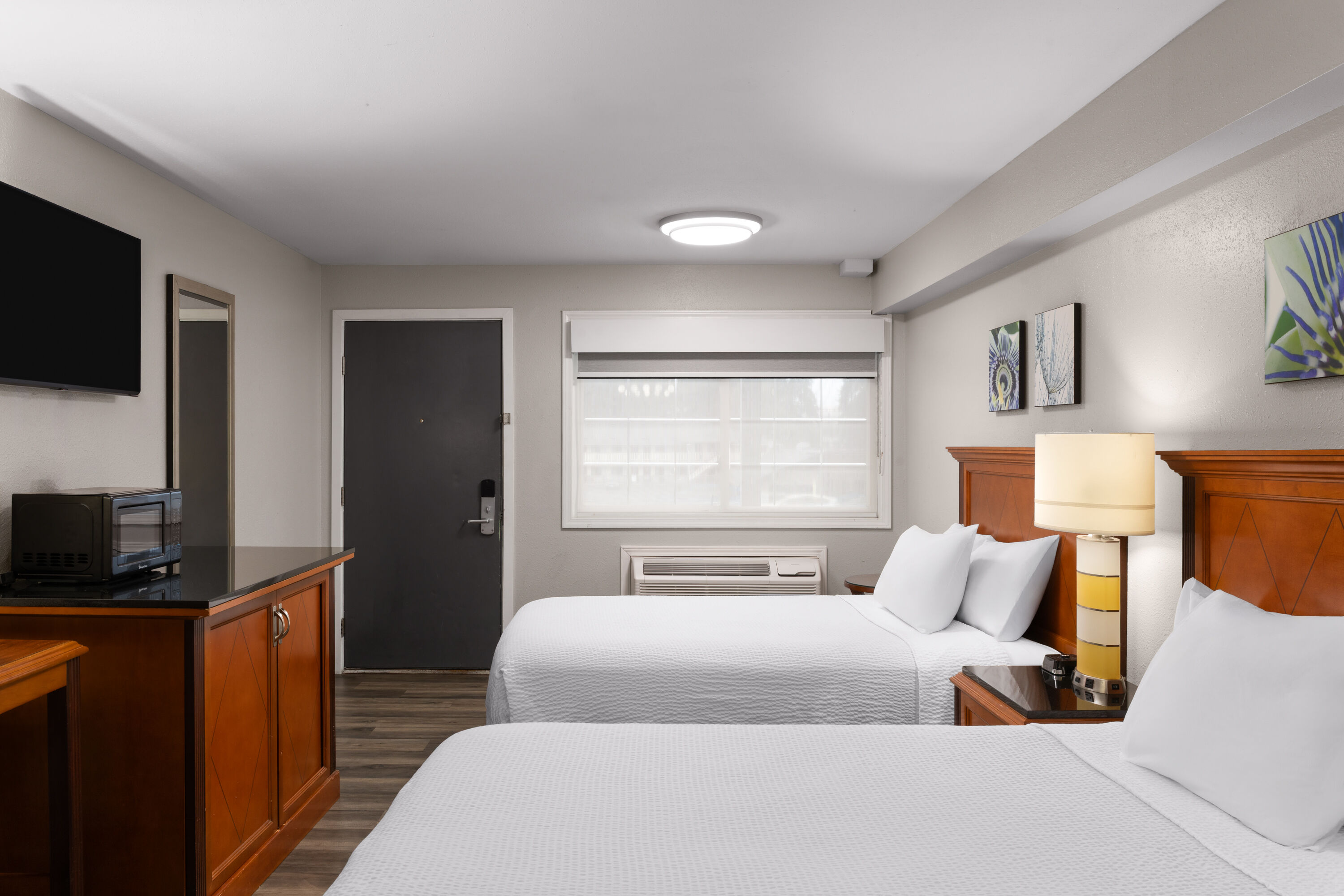 Guest room at the Basecamp Puyallup a Travelodge by Wyndham in Puyallup, Washington