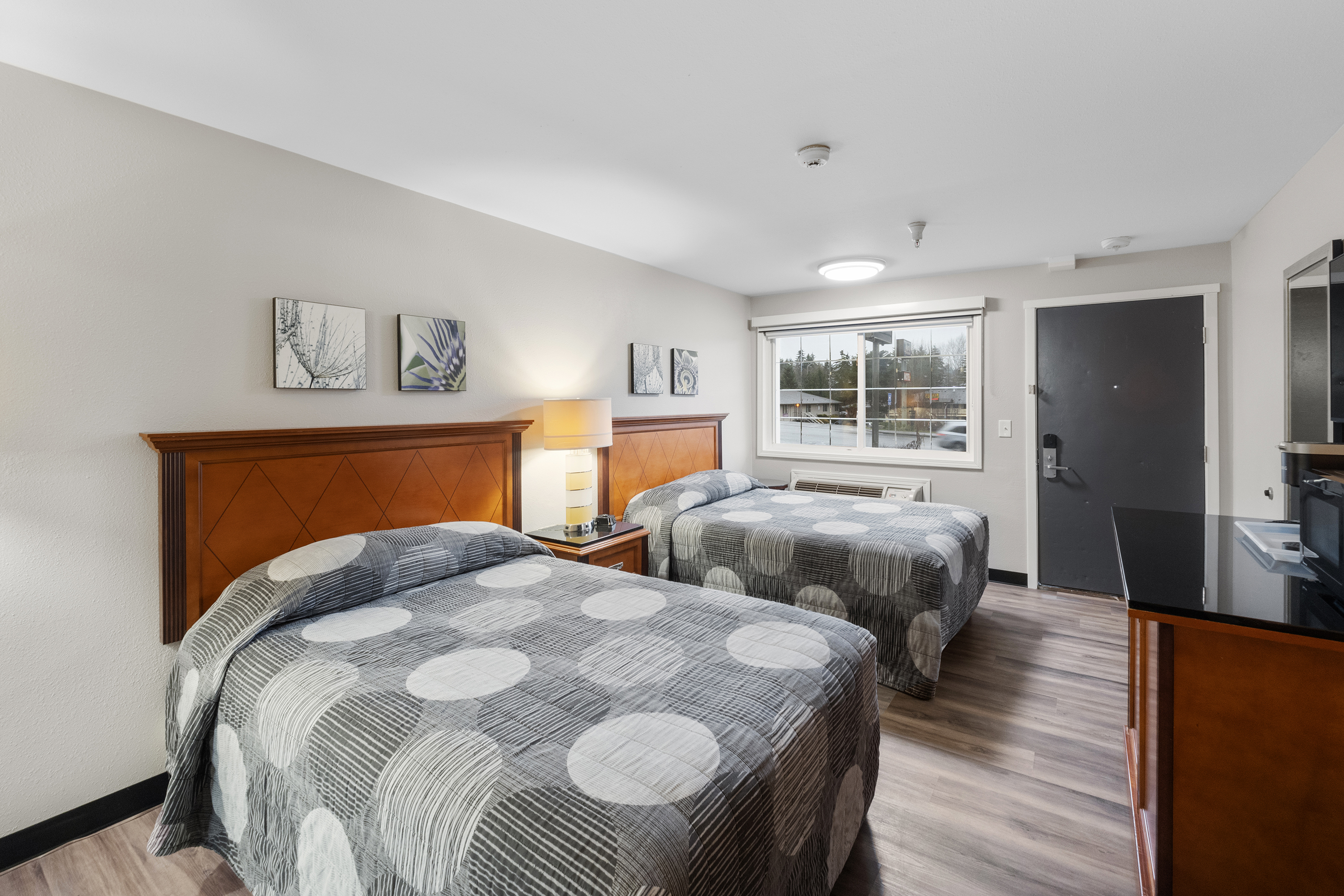 Guest room at the Basecamp Puyallup a Travelodge by Wyndham in Puyallup, Washington