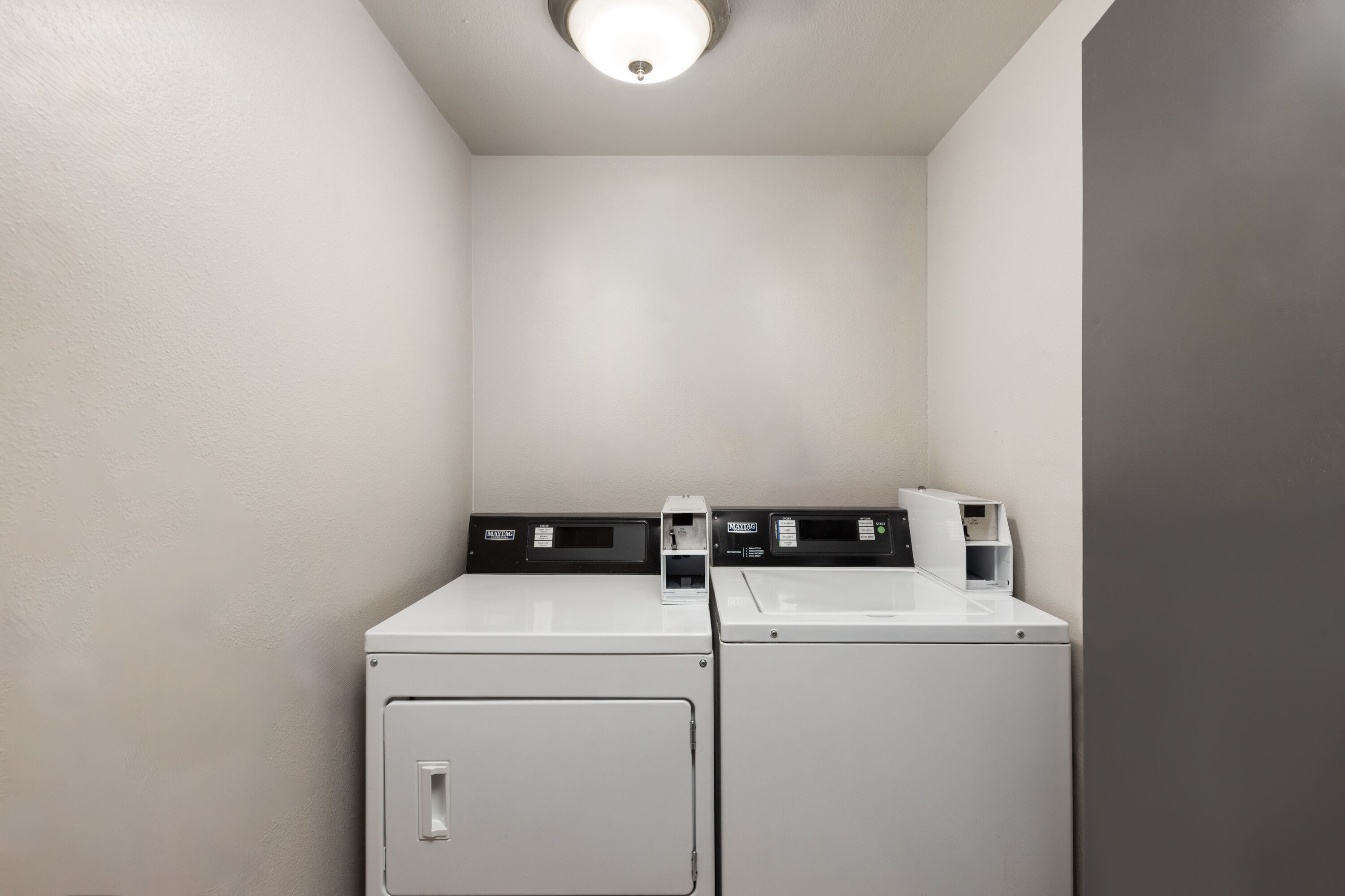 Laundry facilities at Basecamp Puyallup a Travelodge by Wyndham in Puyallup, Washington