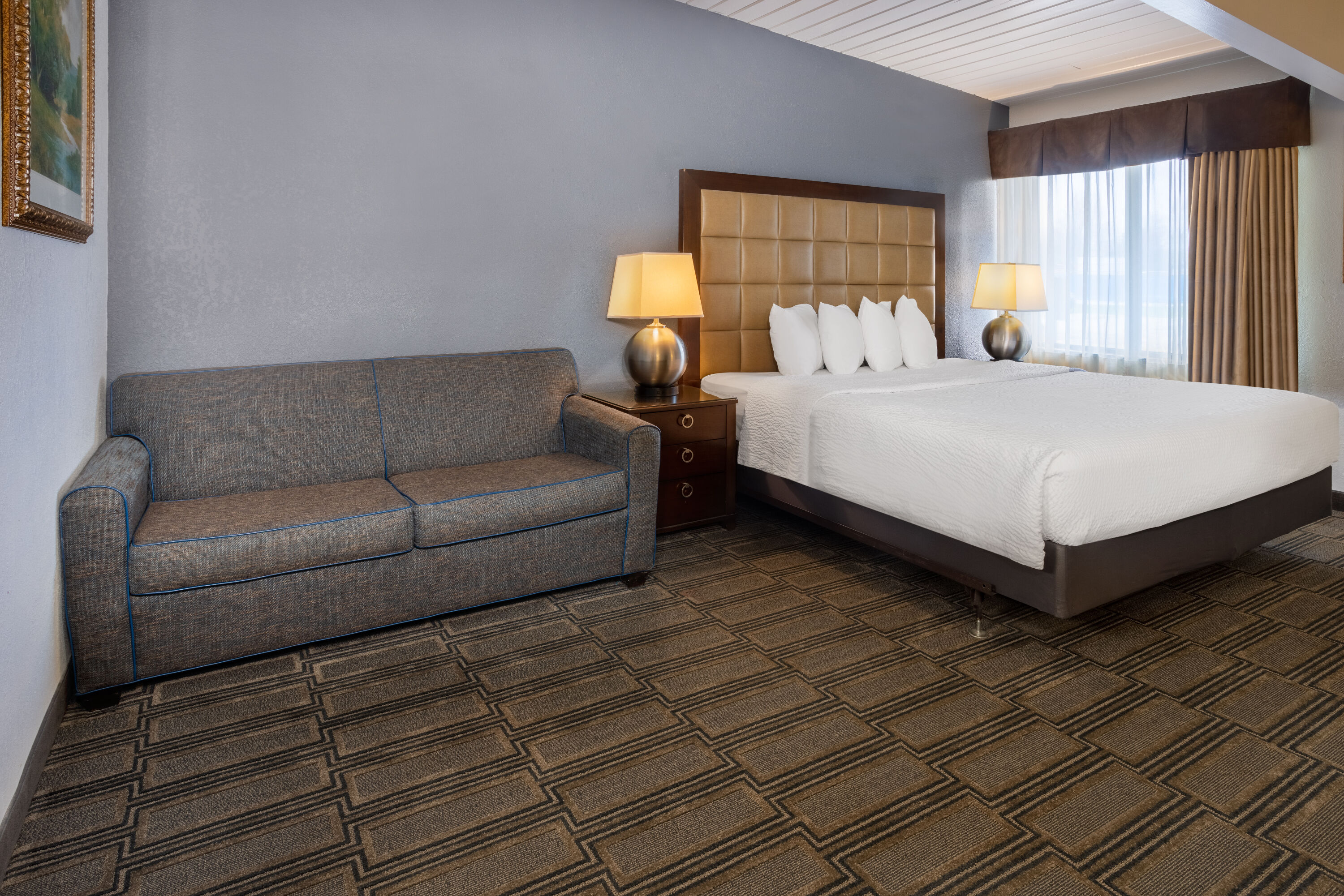 Guest room at the Travelodge by Wyndham Appleton in Appleton, Wisconsin