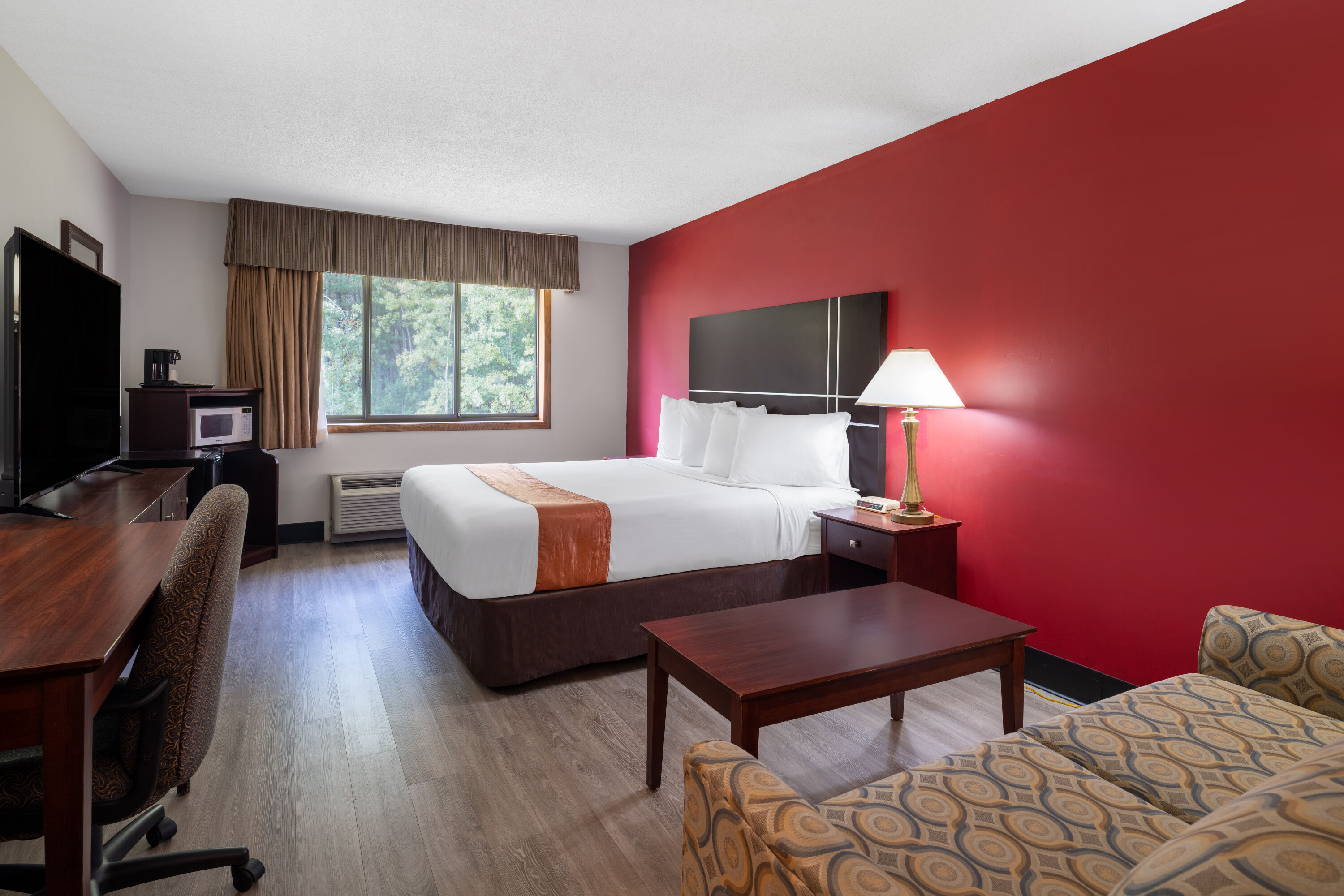 Guest room at the Travelodge by Wyndham Merrill in Merrill, Wisconsin