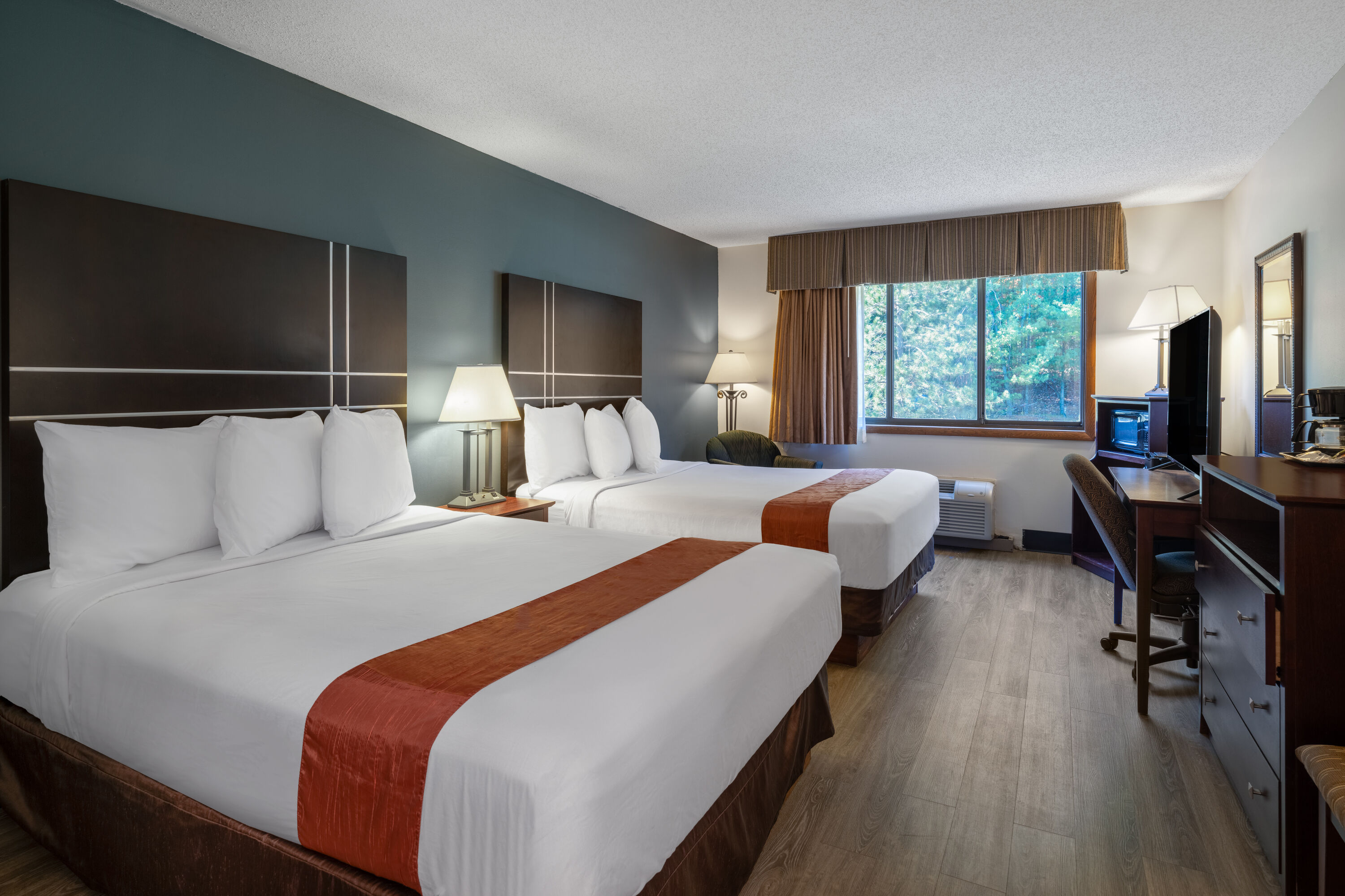 Guest room at the Travelodge by Wyndham Merrill in Merrill, Wisconsin