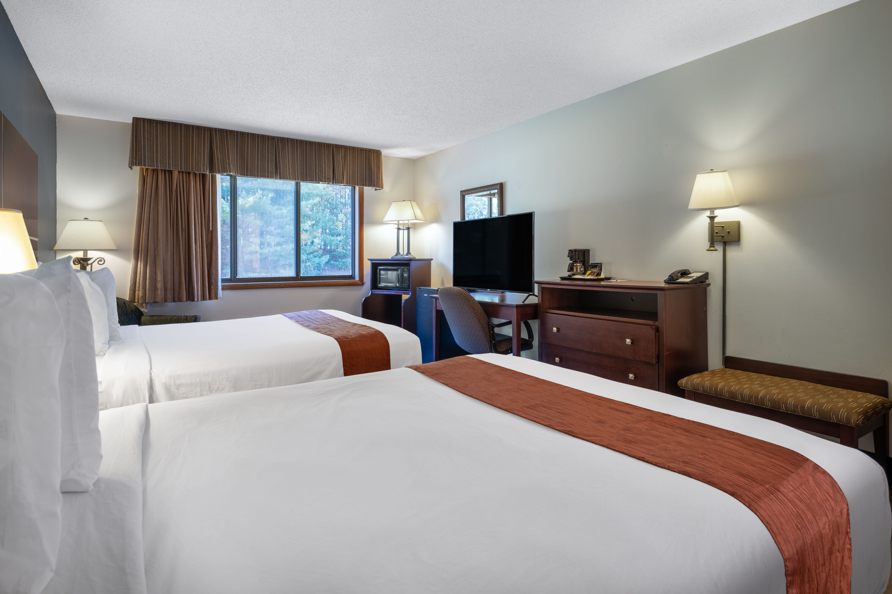 Guest room at the Travelodge by Wyndham Merrill in Merrill, Wisconsin