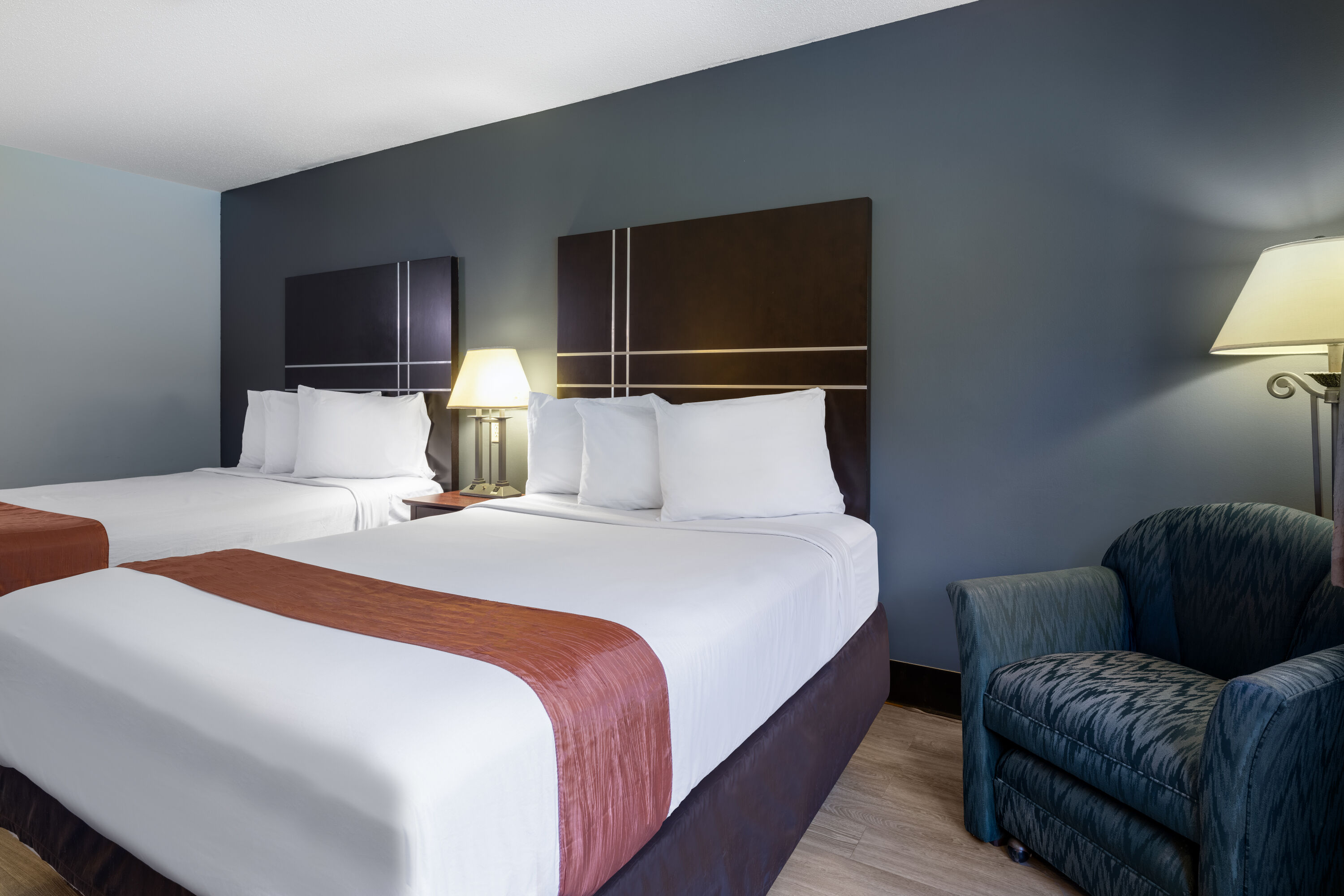 Guest room at the Travelodge by Wyndham Merrill in Merrill, Wisconsin