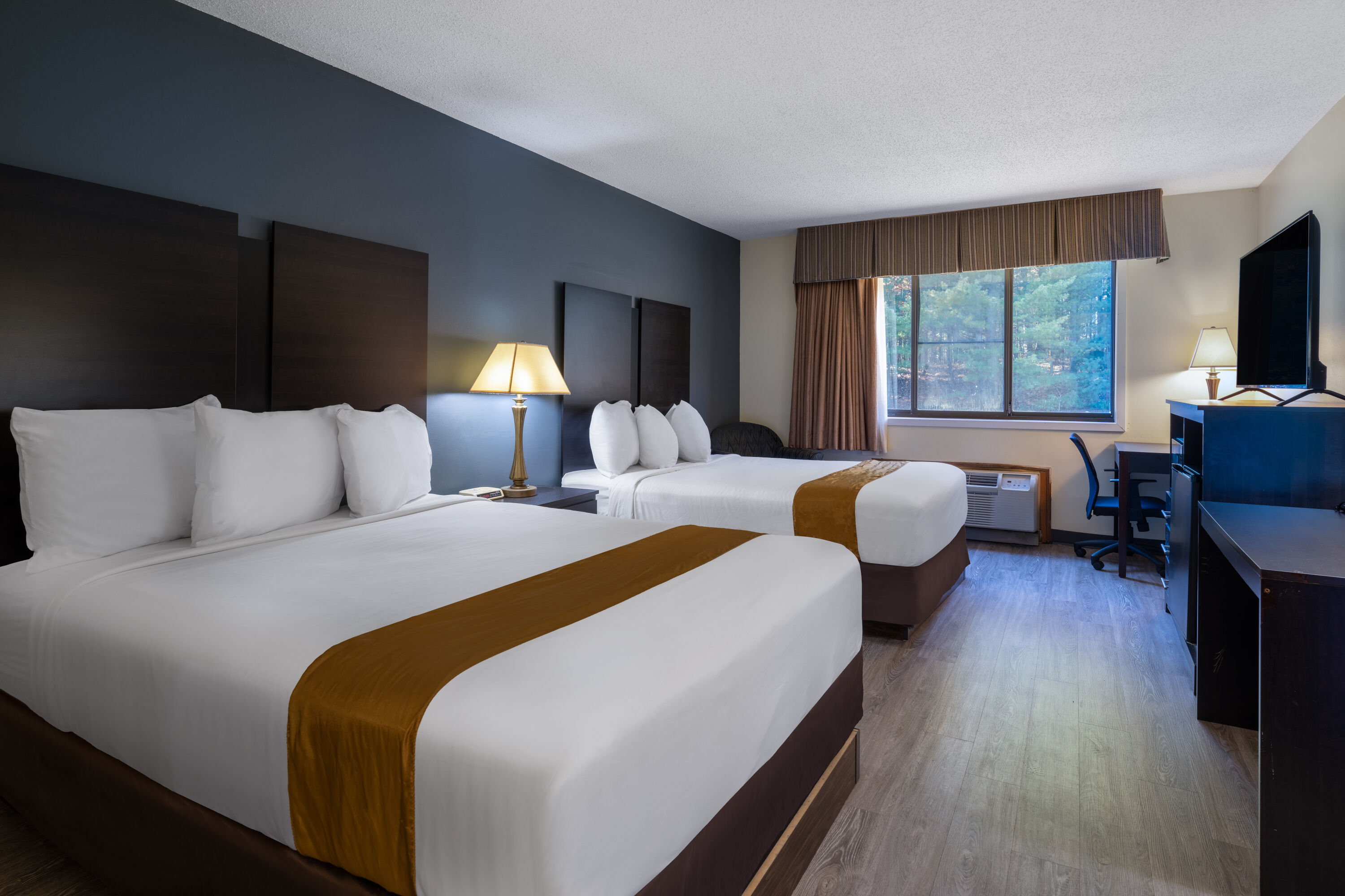 Guest room at the Travelodge by Wyndham Merrill in Merrill, Wisconsin