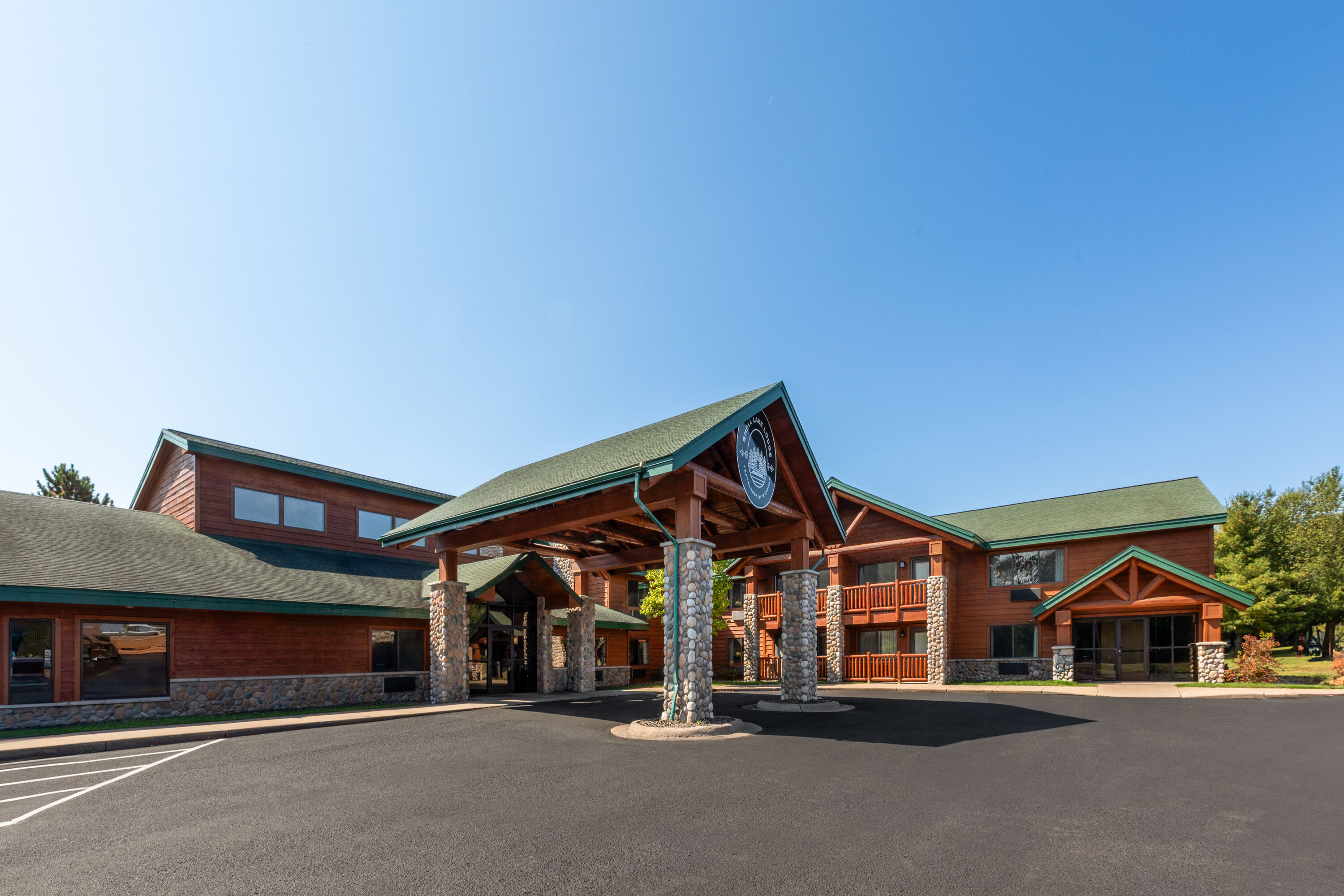 Exterior Day Image of Shell Lake Lodge, a Travelodge by Wyndham hotel in Shell Lake, Wisconsin