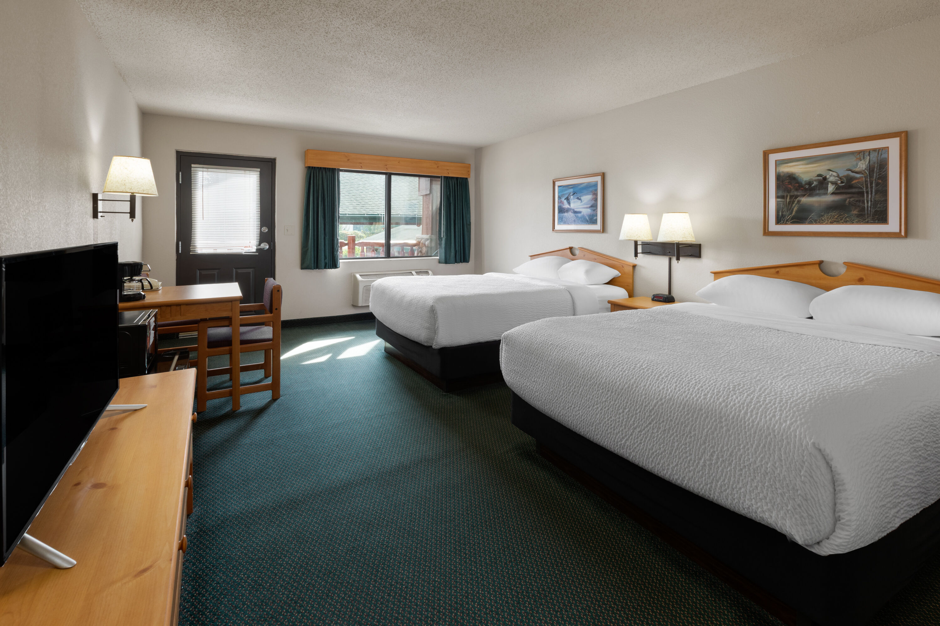 Guest room at the Shell Lake Lodge, a Travelodge by Wyndham in Shell Lake, Wisconsin