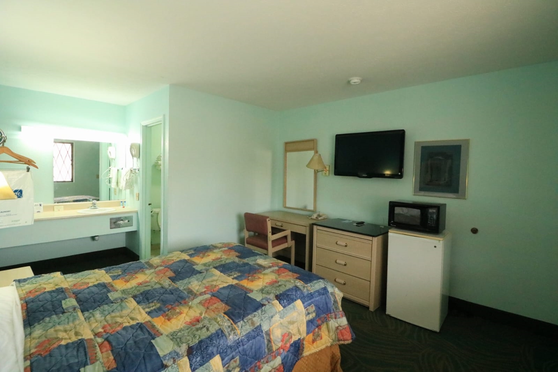 Guest room at the Travelodge by Wyndham Parkersburg in Parkersburg, West Virginia