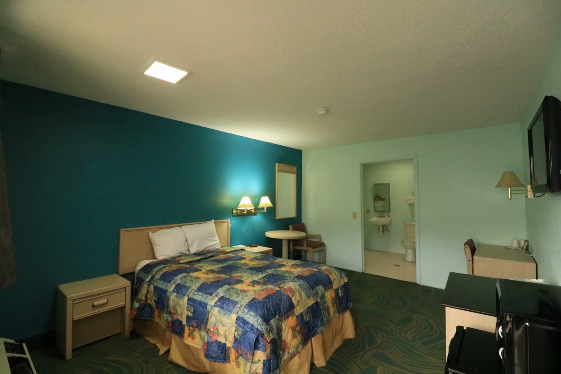Guest room at the Travelodge by Wyndham Parkersburg in Parkersburg, West Virginia
