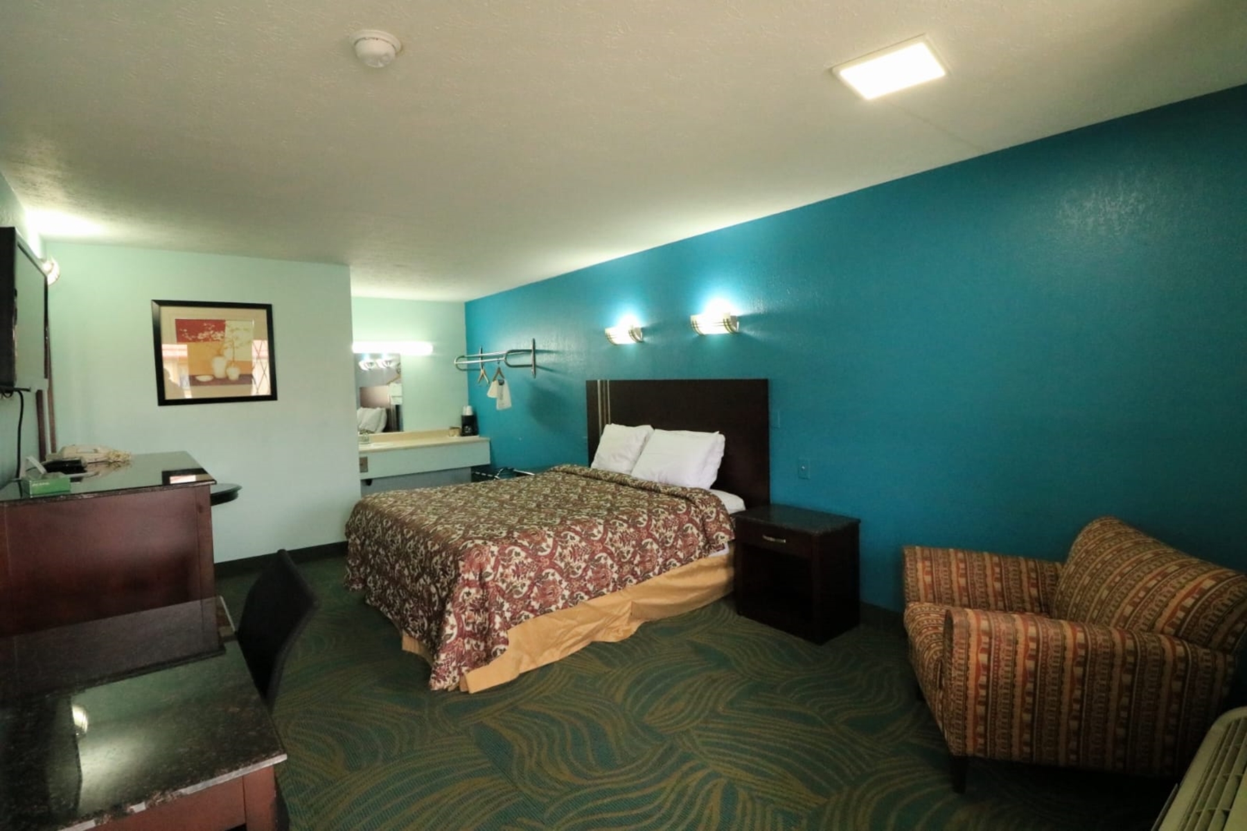 Guest room at the Travelodge by Wyndham Parkersburg in Parkersburg, West Virginia