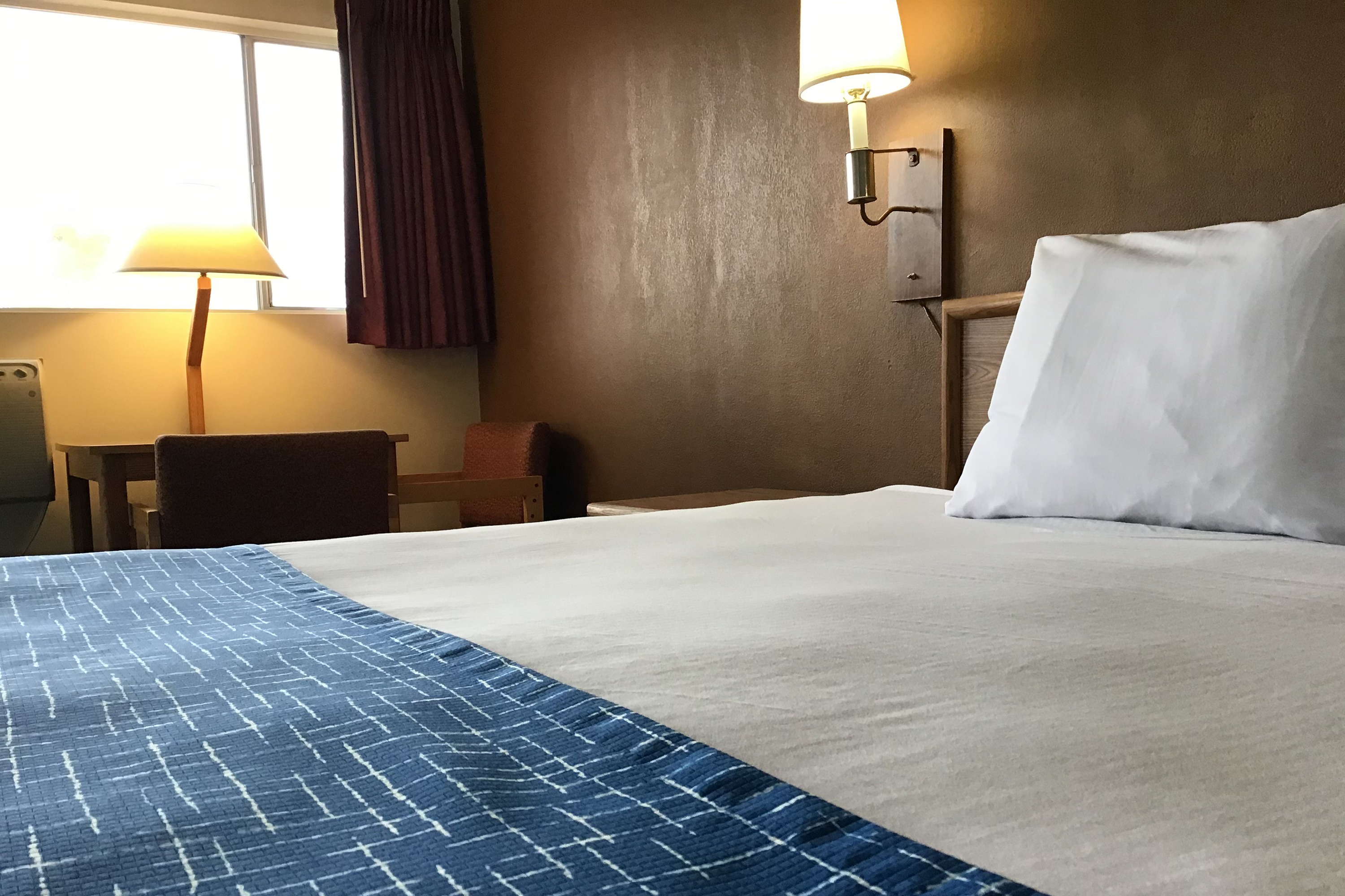 Guest room at the Travelodge by Wyndham Powell in Powell, Wyoming