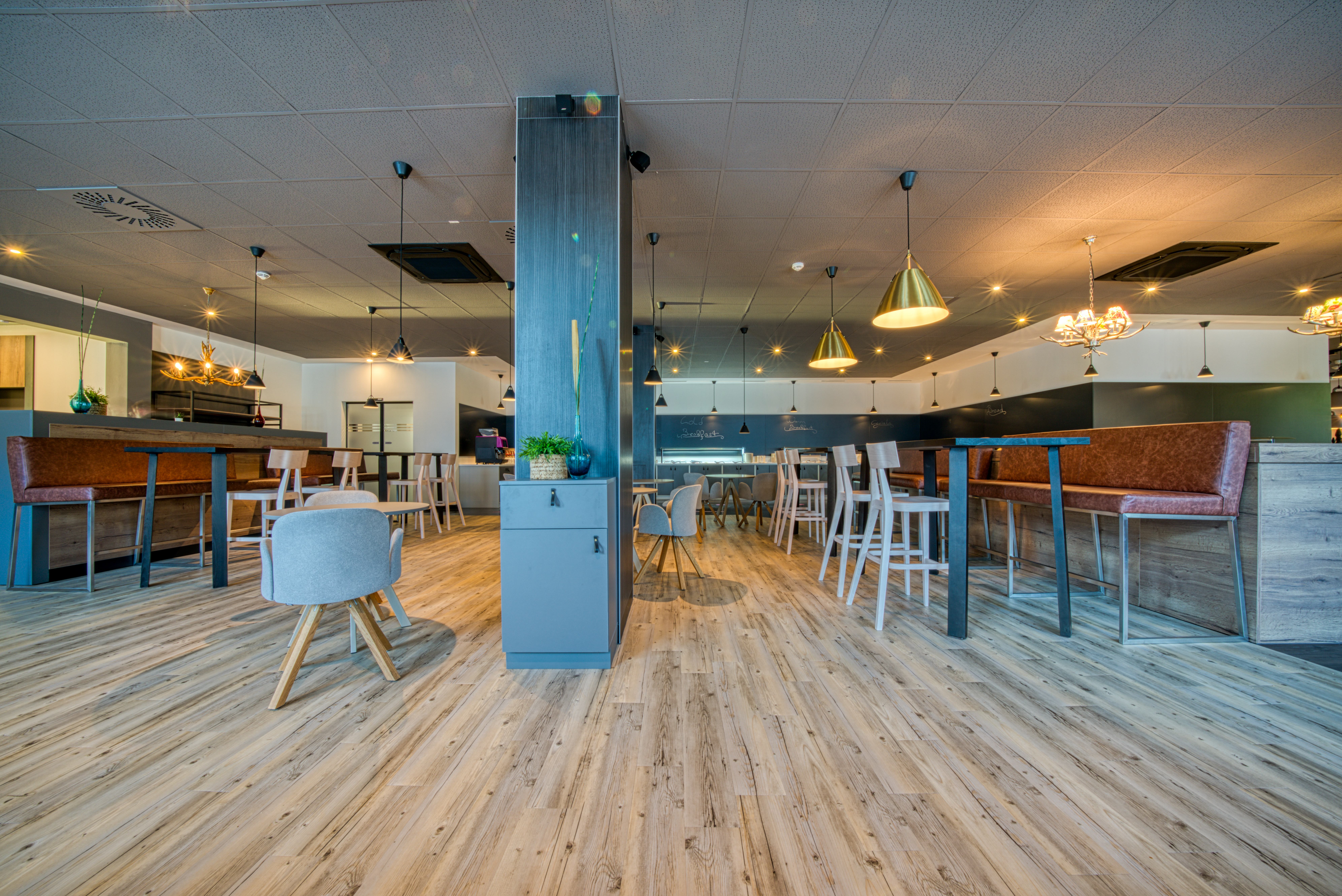 FourSide Hotel Salzburg, Trademark Collection by Wyndham restaurant breakfast area with seating in Salzburg, Other than US/Canada