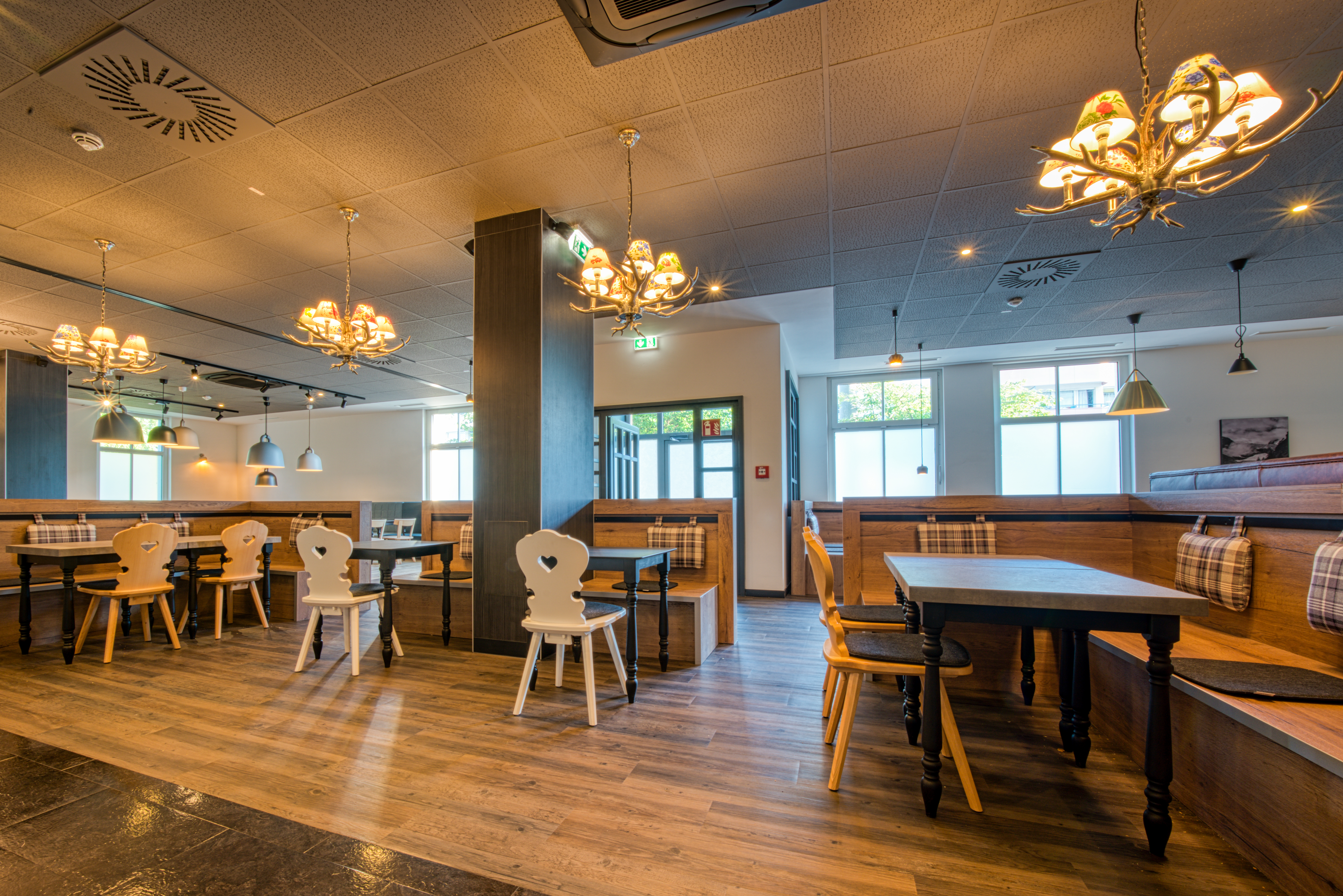 FourSide Hotel Salzburg, Trademark Collection by Wyndham restaurant breakfast area with seating in Salzburg, Other than US/Canada