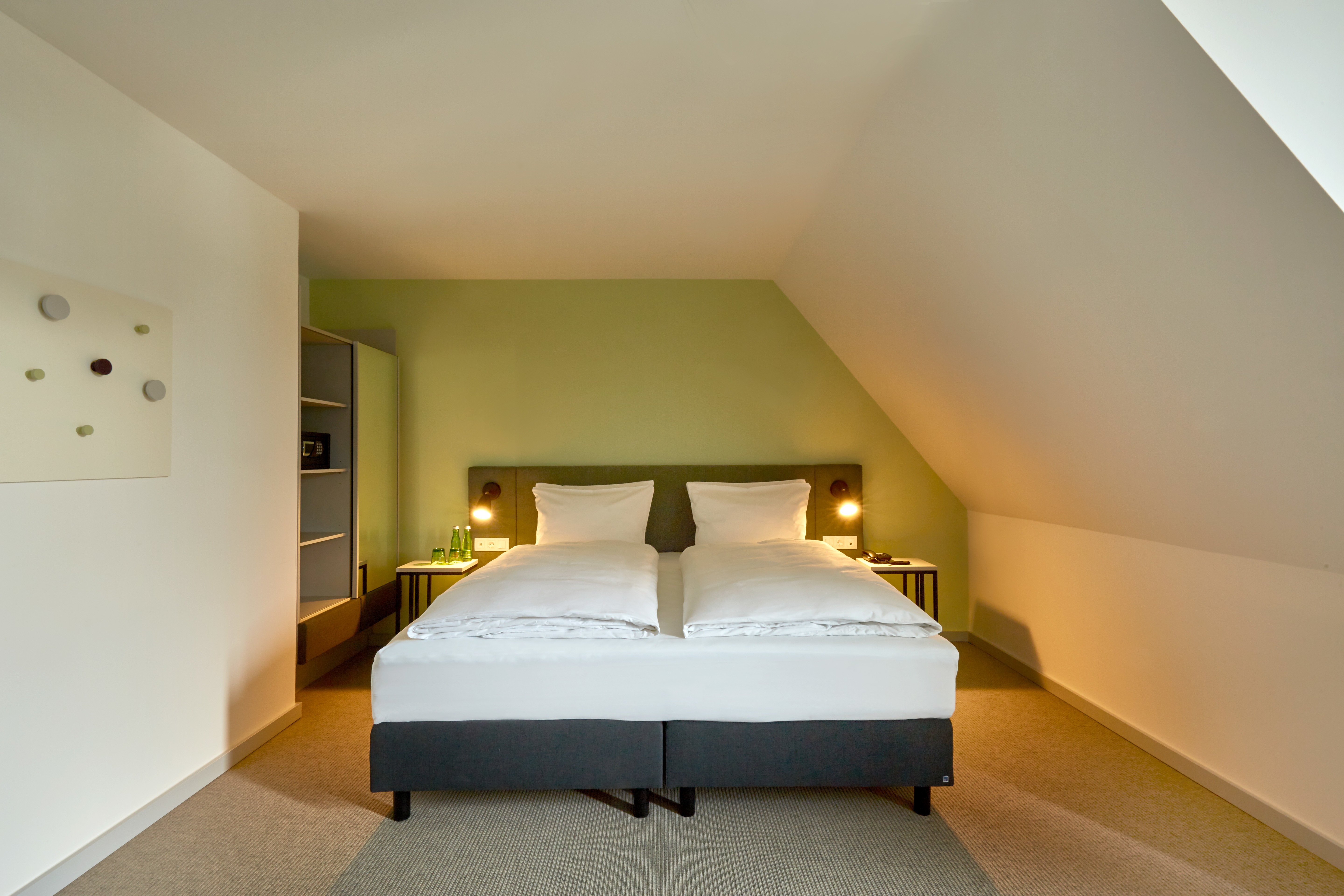 Guest room at the H+ Hotel Wien in Vienna, Other than US/Canada