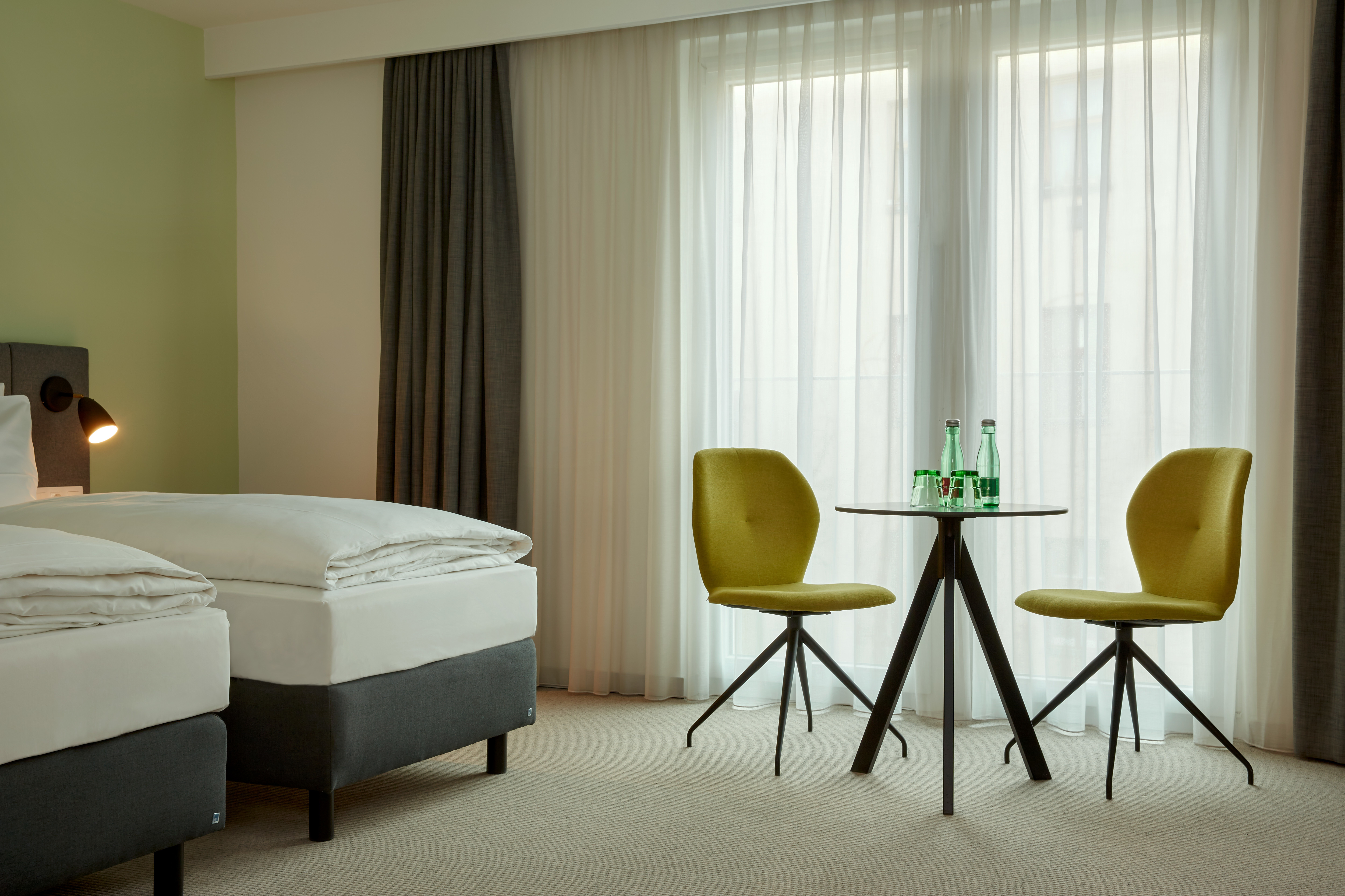 Guest room at the H+ Hotel Wien in Vienna, Other than US/Canada